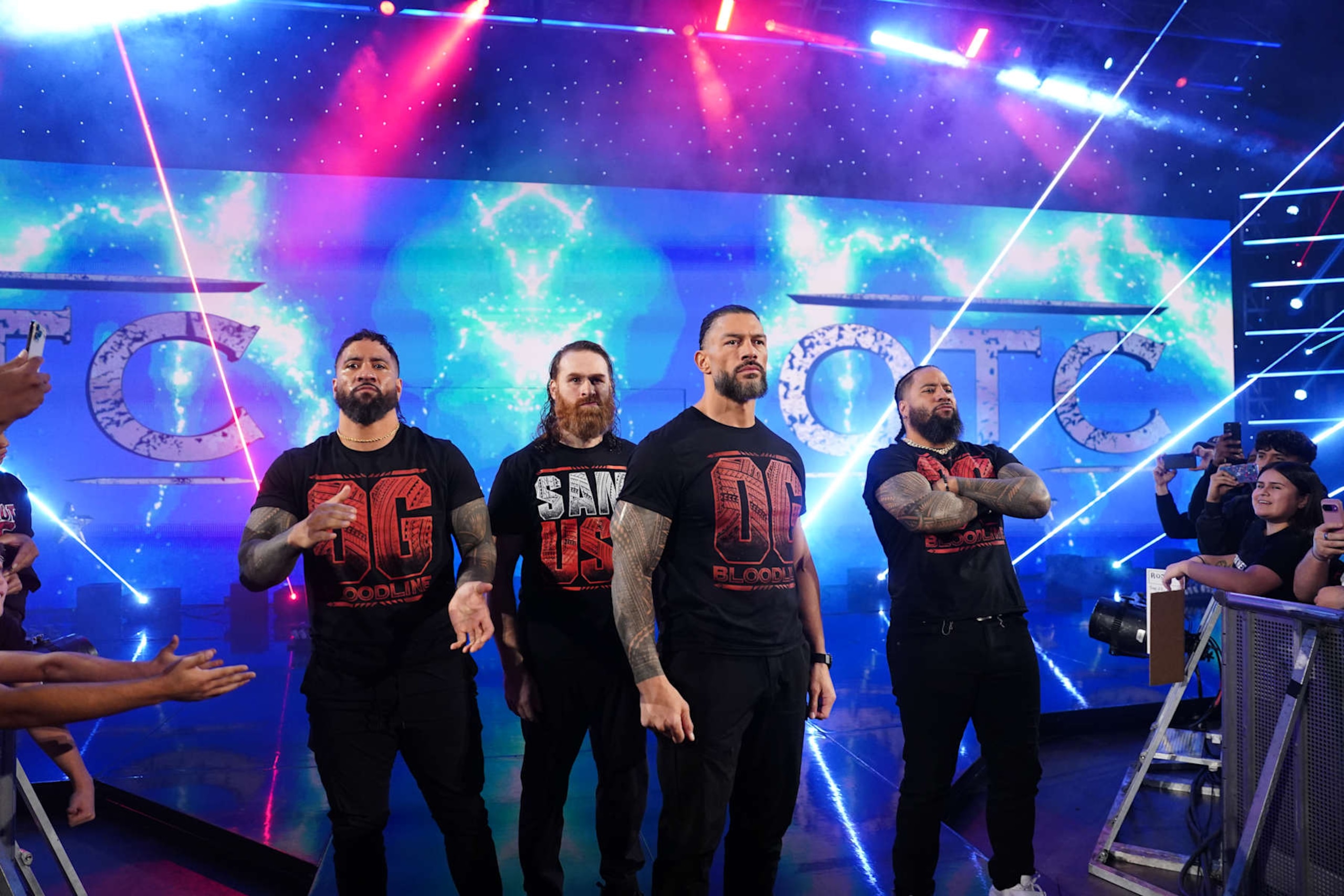 SALT LAKE CITY, UTAH - NOVEMBER 22: Jey Uso, Sami Zayn, Roman Reigns, and Jimmy Uso entrance during WWE SmackDown at Delta Center on November 22, 2024 in Salt Lake City, Utah.  (Photo by WWE/Getty Images)
