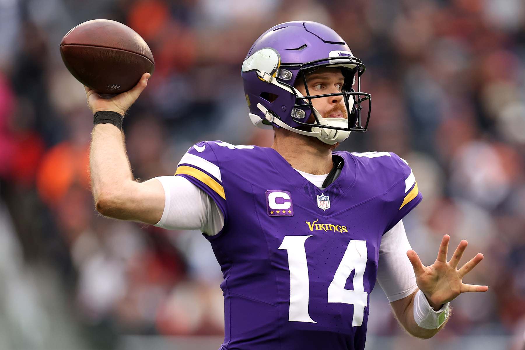 CHICAGO, ILLINOIS - NOVEMBER 24: Sam Darnold #14 of the Minnesota Vikings throws a pass against the Chicago Bears during the third quarter at Soldier Field on November 24, 2024 in Chicago, Illinois. (Photo by Luke Hales/Getty Images)