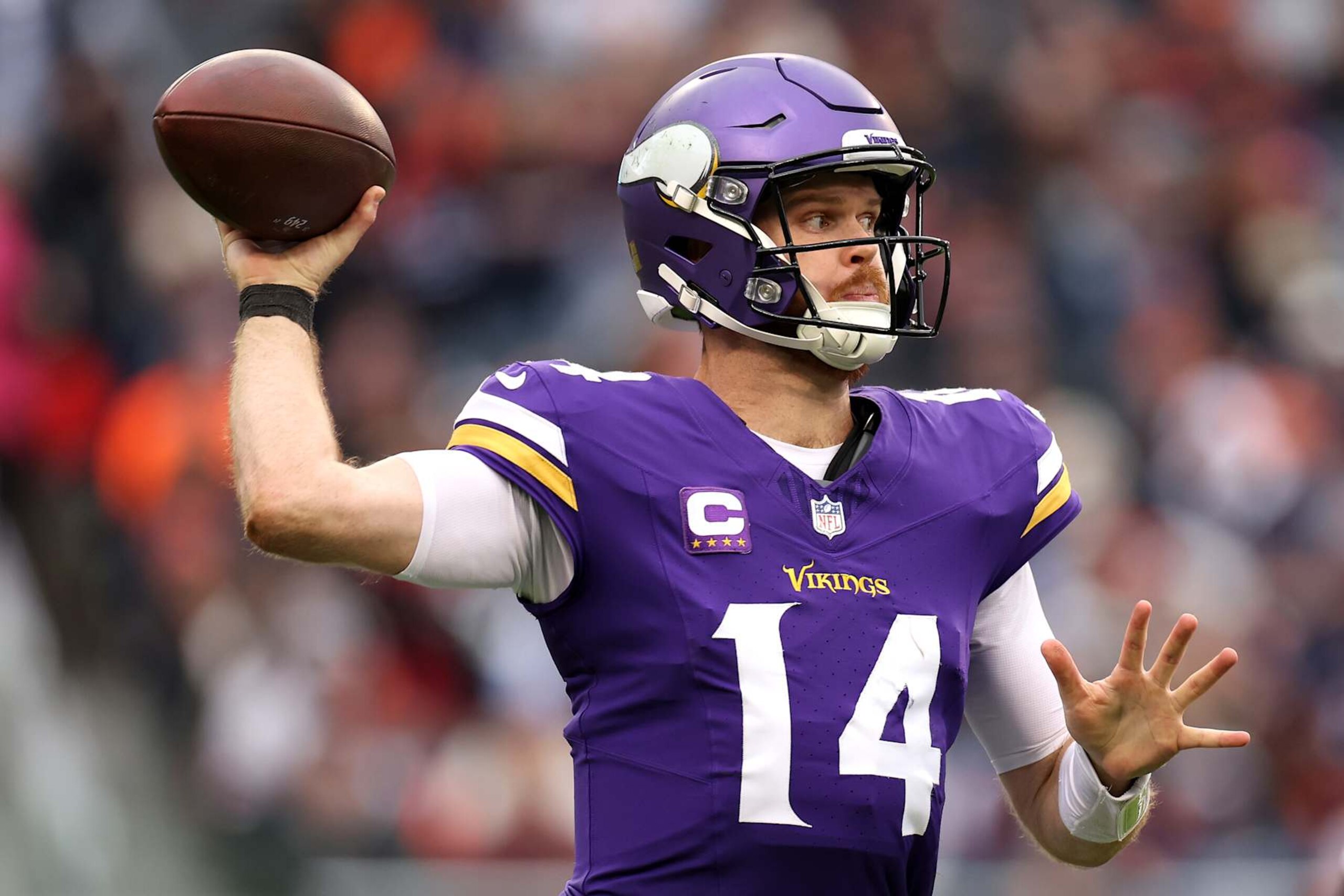 CHICAGO, ILLINOIS - NOVEMBER 24: Sam Darnold #14 of the Minnesota Vikings throws a pass against the Chicago Bears during the third quarter at Soldier Field on November 24, 2024 in Chicago, Illinois. (Photo by Luke Hales/Getty Images)