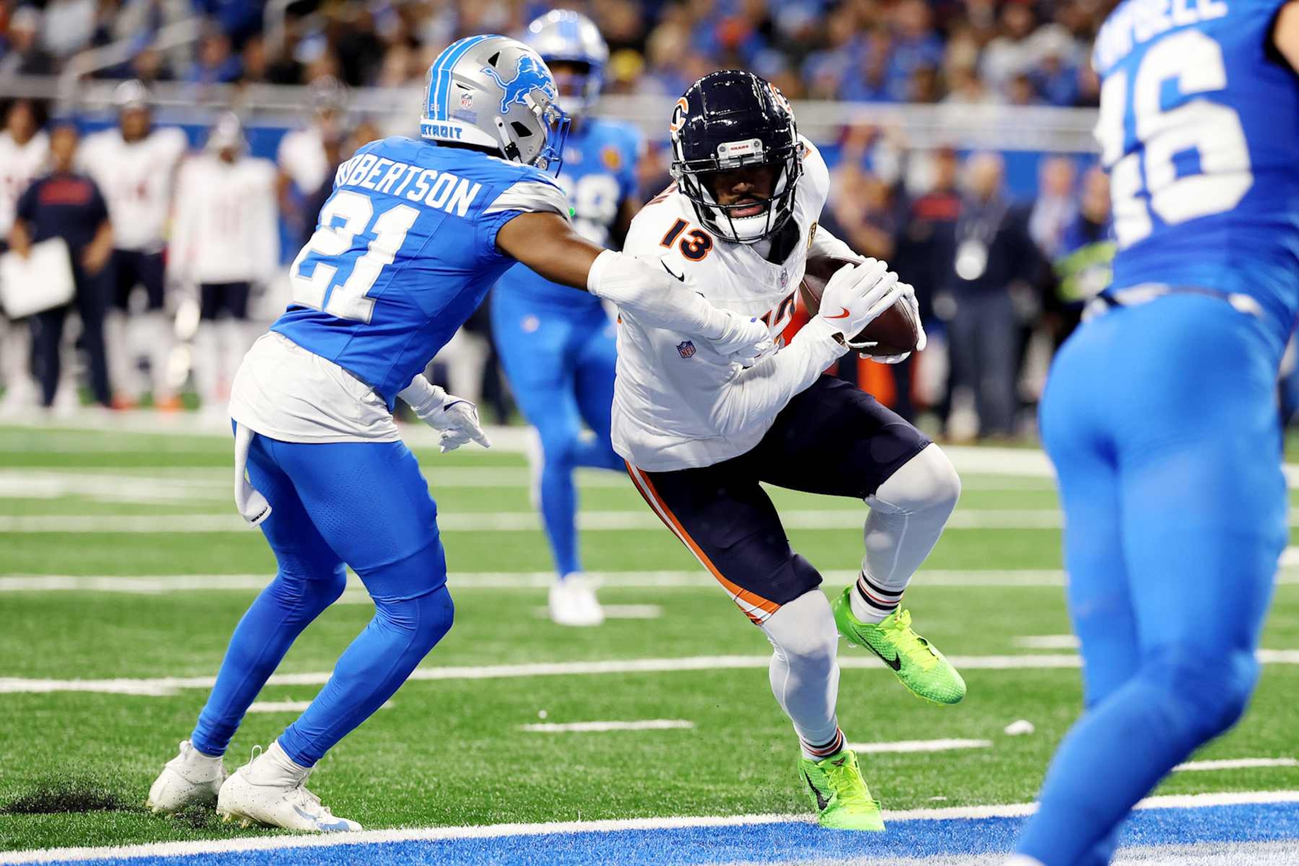 DETROIT, MICHIGAN - NOVEMBER 28: Keenan Allen #13 of the Chicago Bears runs the ball in for a fourth quarter touchdown against Amik Robertson #21 of the Detroit Lions at Ford Field on November 28, 2024 in Detroit, Michigan. (Photo by Gregory Shamus/Getty Images) DETROIT, MICHIGAN - NOVEMBER 28: Keenan Allen #13 of the Chicago Bears runs the ball in for a fourth quarter touchdown against Amik Robertson #21 of the Detroit Lions at Ford Field on November 28, 2024 in Detroit, Michigan. (Photo by Gregory Shamus/Getty Images)