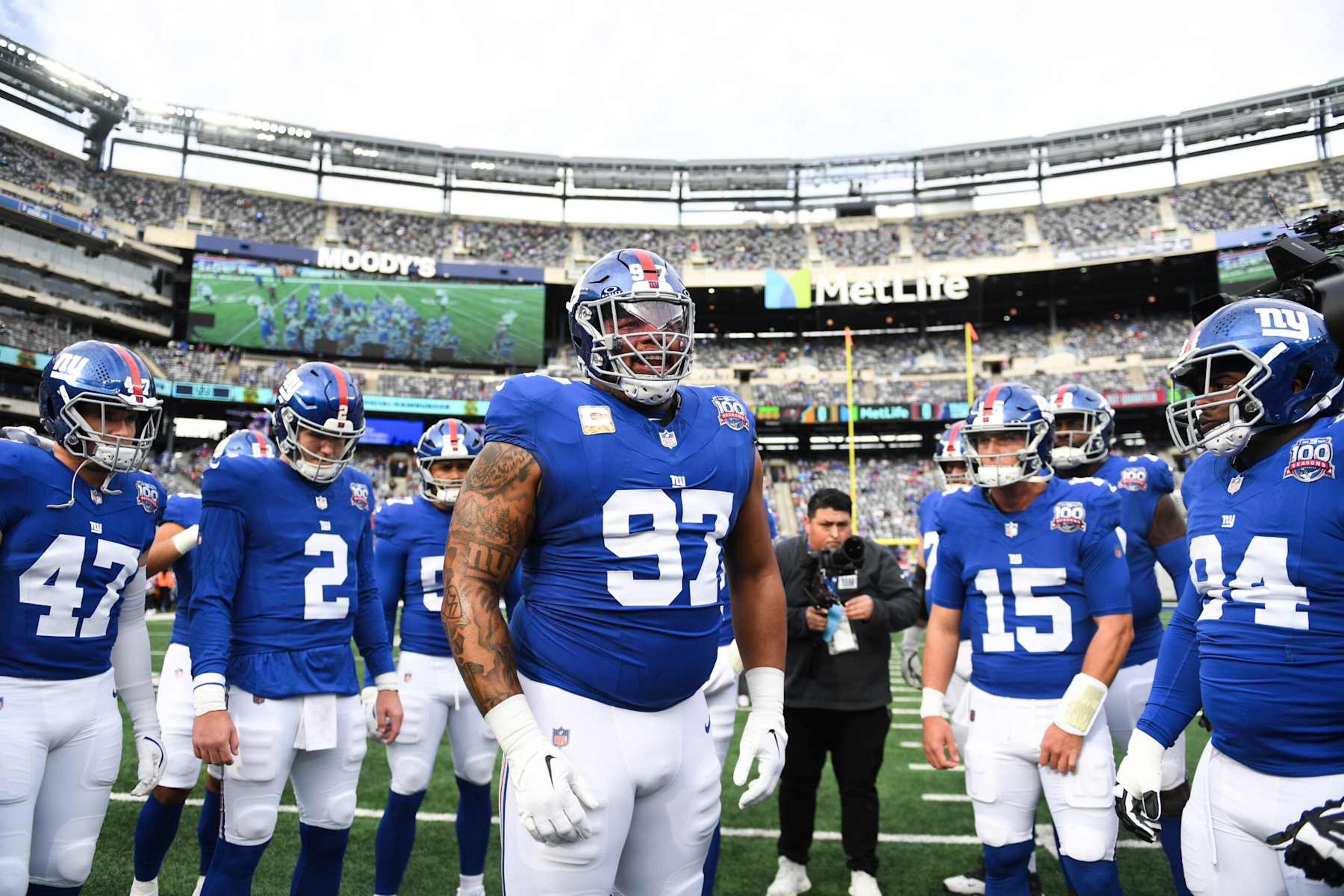 EAST RUTHERFORD, NEW JERSEY - NOVEMBER 24: Dexter Lawrence II #97 of the New York Giants yells out in a huddle prior to the start of the game against the Tampa Bay Buccaneers at MetLife Stadium on November 24, 2024 in East Rutherford, New Jersey. (Photo by Kathryn Riley/Getty Images)