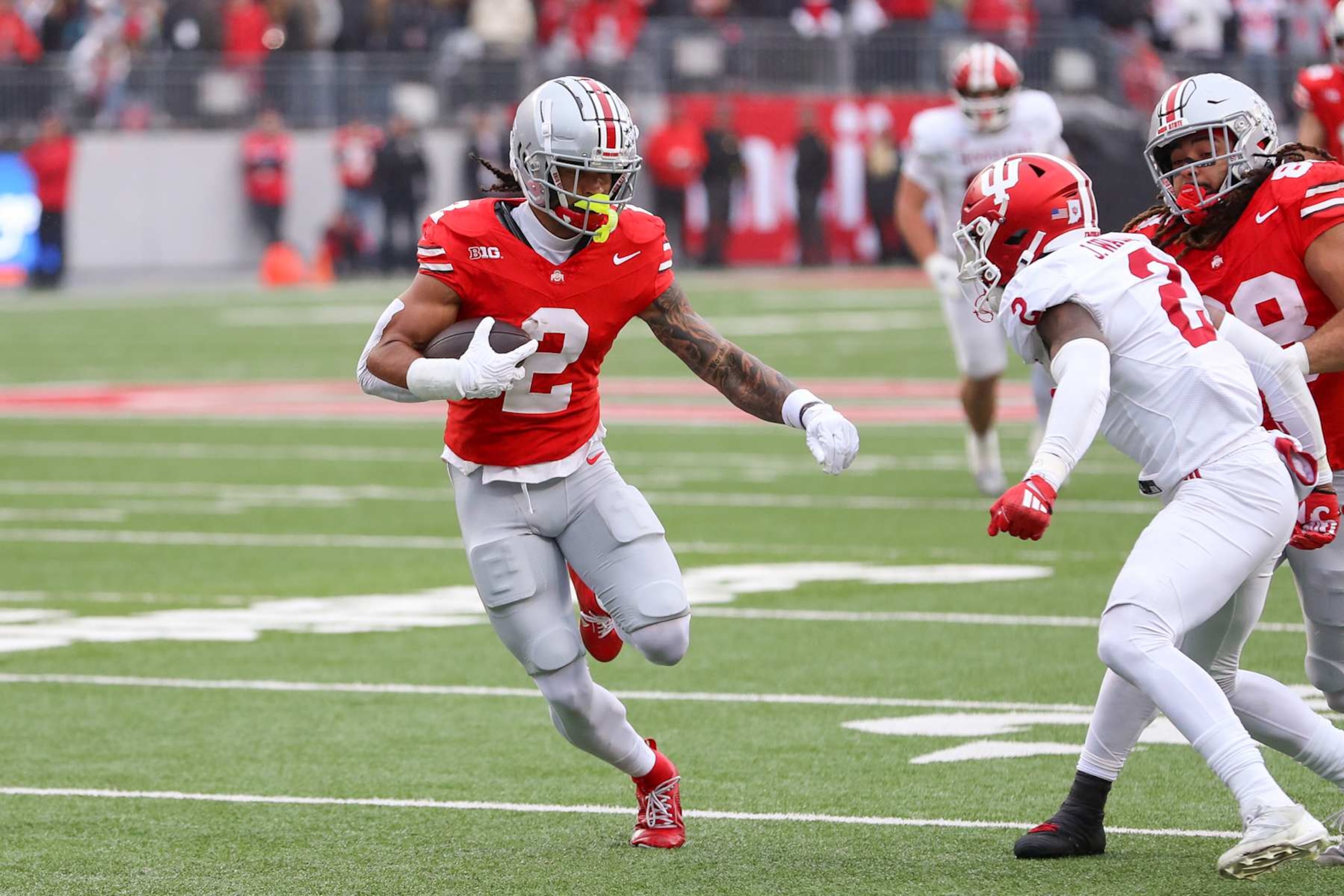 COLUMBUS, OH - NOVEMBER 23: Ohio State Buckeyes wide receiver Emeka Egbuka (2) carries the ball during the game against the Indiana Hoosiers and the Ohio State Buckeyes on November 23, 2024, at Ohio Stadium in Columbus, OH. (Photo by Ian Johnson/Icon Sportswire via Getty Images) COLUMBUS, OH - NOVEMBER 23: Ohio State Buckeyes wide receiver Emeka Egbuka (2) carries the ball during the game against the Indiana Hoosiers and the Ohio State Buckeyes on November 23, 2024, at Ohio Stadium in Columbus, OH. (Photo by Ian Johnson/Icon Sportswire via Getty Images)