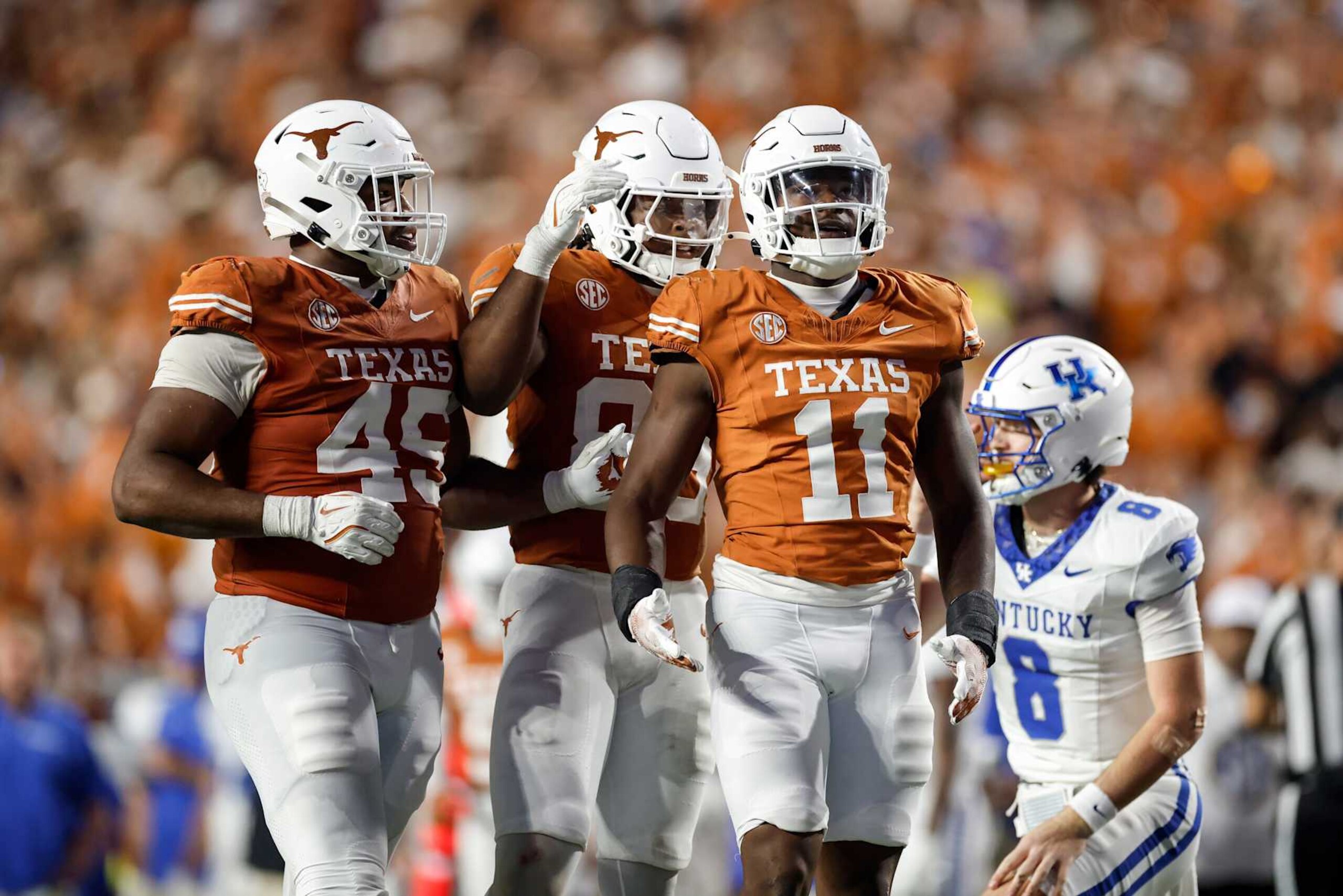 AUSTIN, TEXAS - NOVEMBER 23: Colin Simmons #11 of the Texas Longhorns celebrates after a sack in the second half against the Kentucky Wildcats at Darrell K Royal-Texas Memorial Stadium on November 23, 2024 in Austin, Texas. (Photo by Tim Warner/Getty Images)