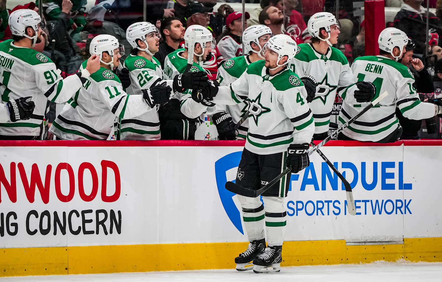 RALEIGH, NORTH CAROLINA - NOVEMBER 25:  Miro Heiskanen #4 of the Dallas Stars celebrates with teammates after a goal during the third period against the Carolina Hurricanes at Lenovo Center on November 25, 2024 in Raleigh, North Carolina.  (Photo by Josh Lavallee/NHLI via Getty Images)