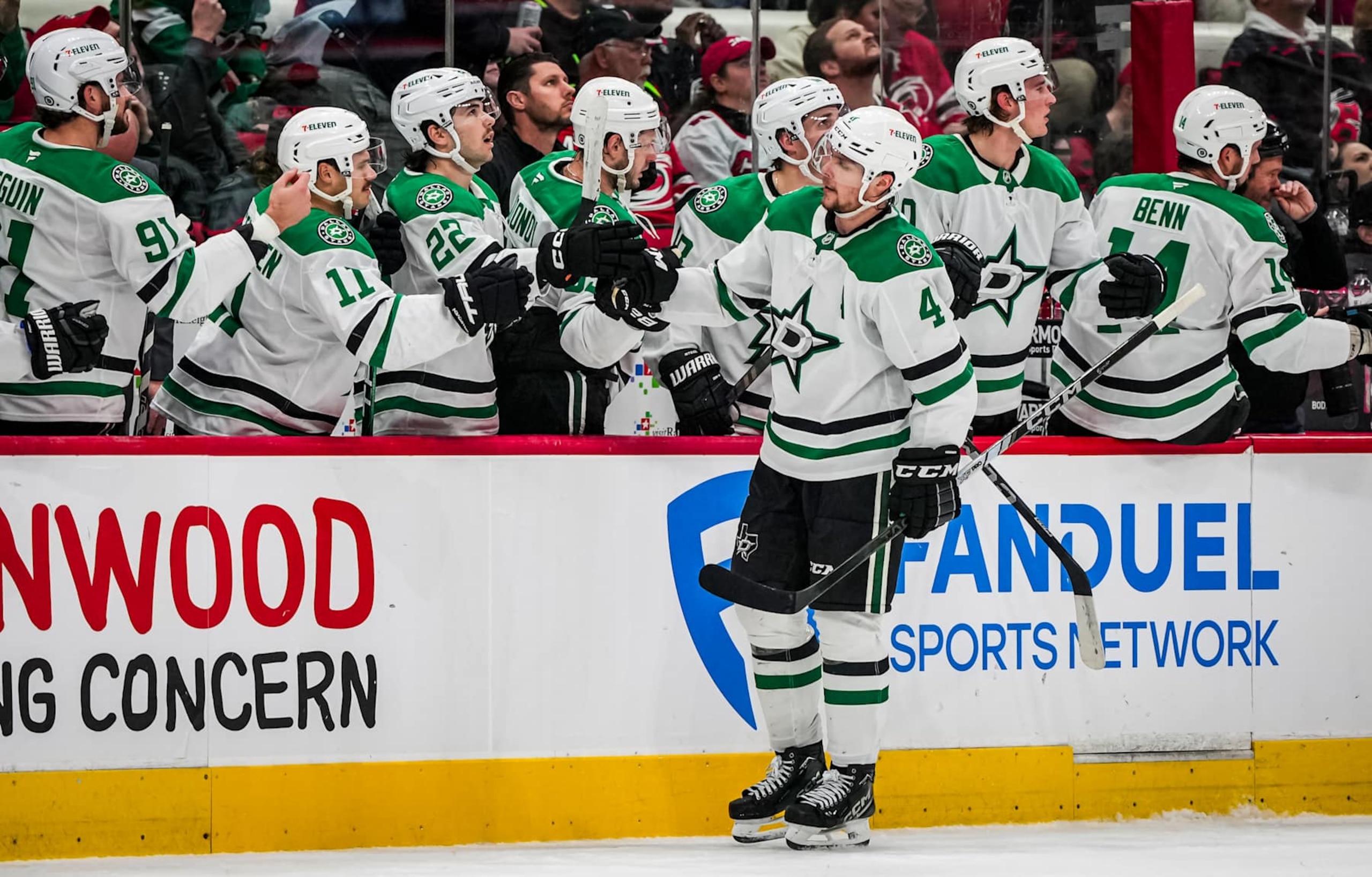 RALEIGH, NORTH CAROLINA - NOVEMBER 25:  Miro Heiskanen #4 of the Dallas Stars celebrates with teammates after a goal during the third period against the Carolina Hurricanes at Lenovo Center on November 25, 2024 in Raleigh, North Carolina.  (Photo by Josh Lavallee/NHLI via Getty Images)