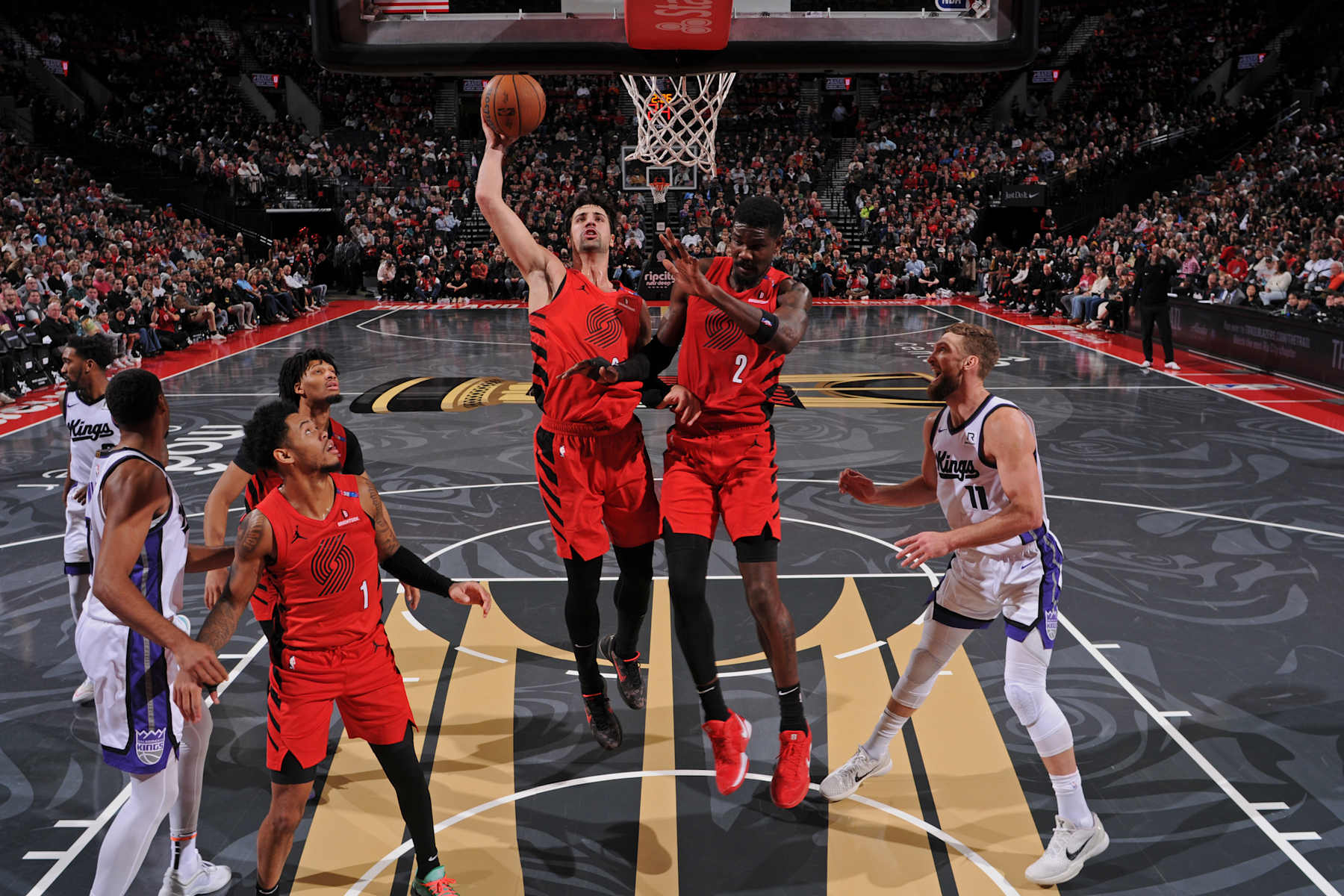 PORTLAND, OR - NOVEMBER 29: Deni Avdija #8 of the Portland Trail Blazers goes up for the rebound during the game against the Sacramento Kings during the Emirates NBA Cup on November 29, 2024 at the Moda Center Arena in Portland, Oregon. NOTE TO USER: User expressly acknowledges and agrees that, by downloading and or using this photograph, user is consenting to the terms and conditions of the Getty Images License Agreement. Mandatory Copyright Notice: Copyright 2024 NBAE (Photo by Cameron Browne/NBAE via Getty Images)