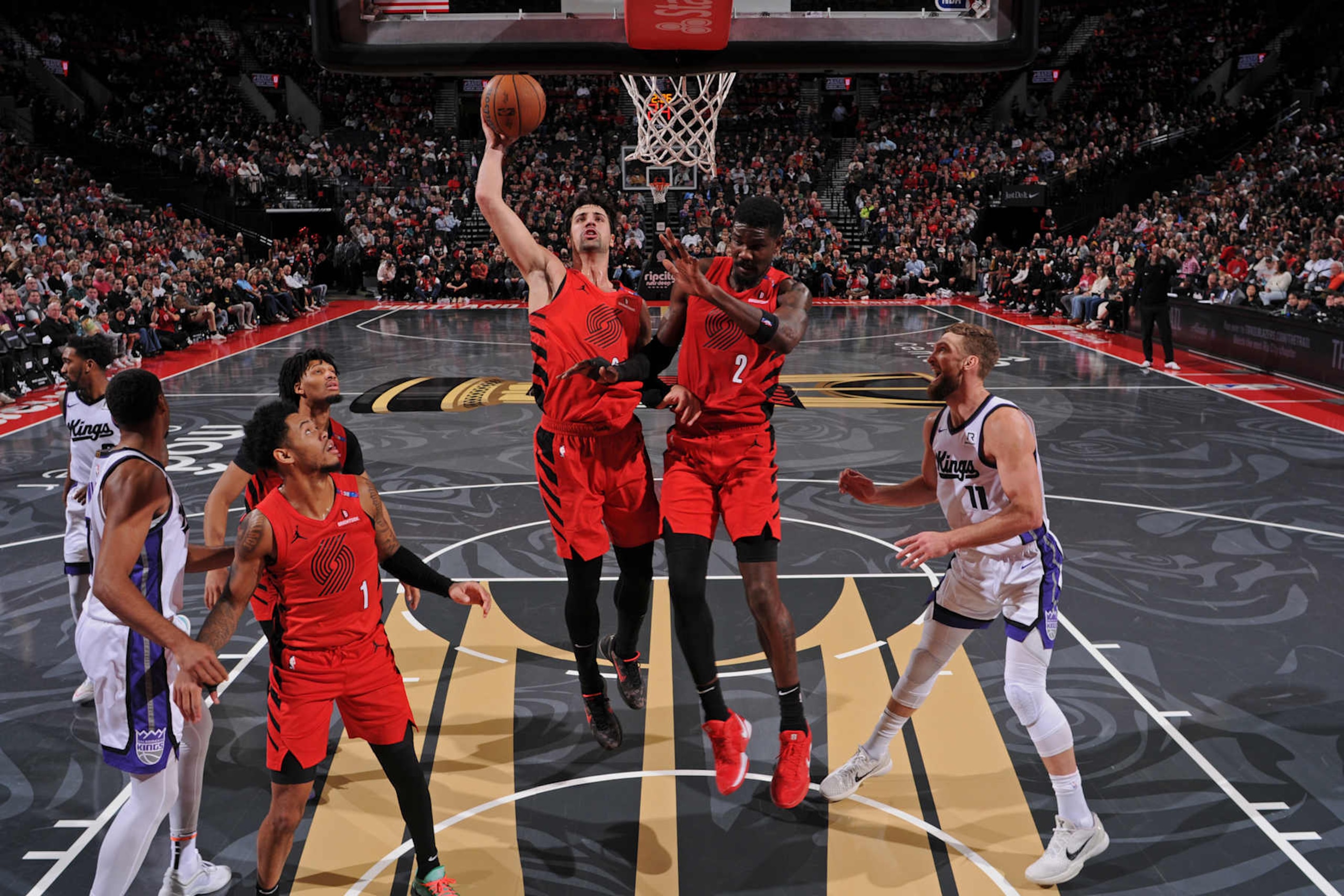 PORTLAND, OR - NOVEMBER 29: Deni Avdija #8 of the Portland Trail Blazers goes up for the rebound during the game against the Sacramento Kings during the Emirates NBA Cup on November 29, 2024 at the Moda Center Arena in Portland, Oregon. NOTE TO USER: User expressly acknowledges and agrees that, by downloading and or using this photograph, user is consenting to the terms and conditions of the Getty Images License Agreement. Mandatory Copyright Notice: Copyright 2024 NBAE (Photo by Cameron Browne/NBAE via Getty Images)