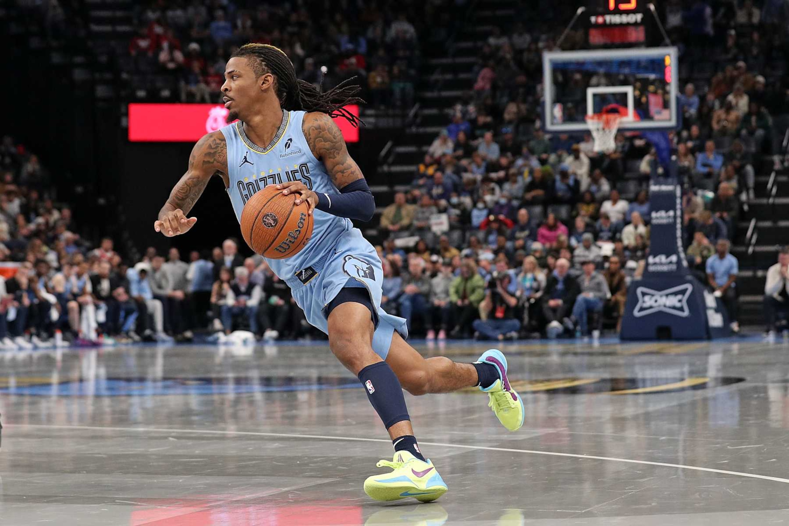 MEMPHIS, TENNESSEE - NOVEMBER 29: Ja Morant #12 of the Memphis Grizzlies goes to the basket against the New Orleans Pelicans during the game of an Emirates NBA Cup game at FedExForum on November 29, 2024 in Memphis, Tennessee. NOTE TO USER: User expressly acknowledges and agrees that, by downloading and or using this photograph, User is consenting to the terms and conditions of the Getty Images License Agreement. (Photo by Justin Ford/Getty Images)