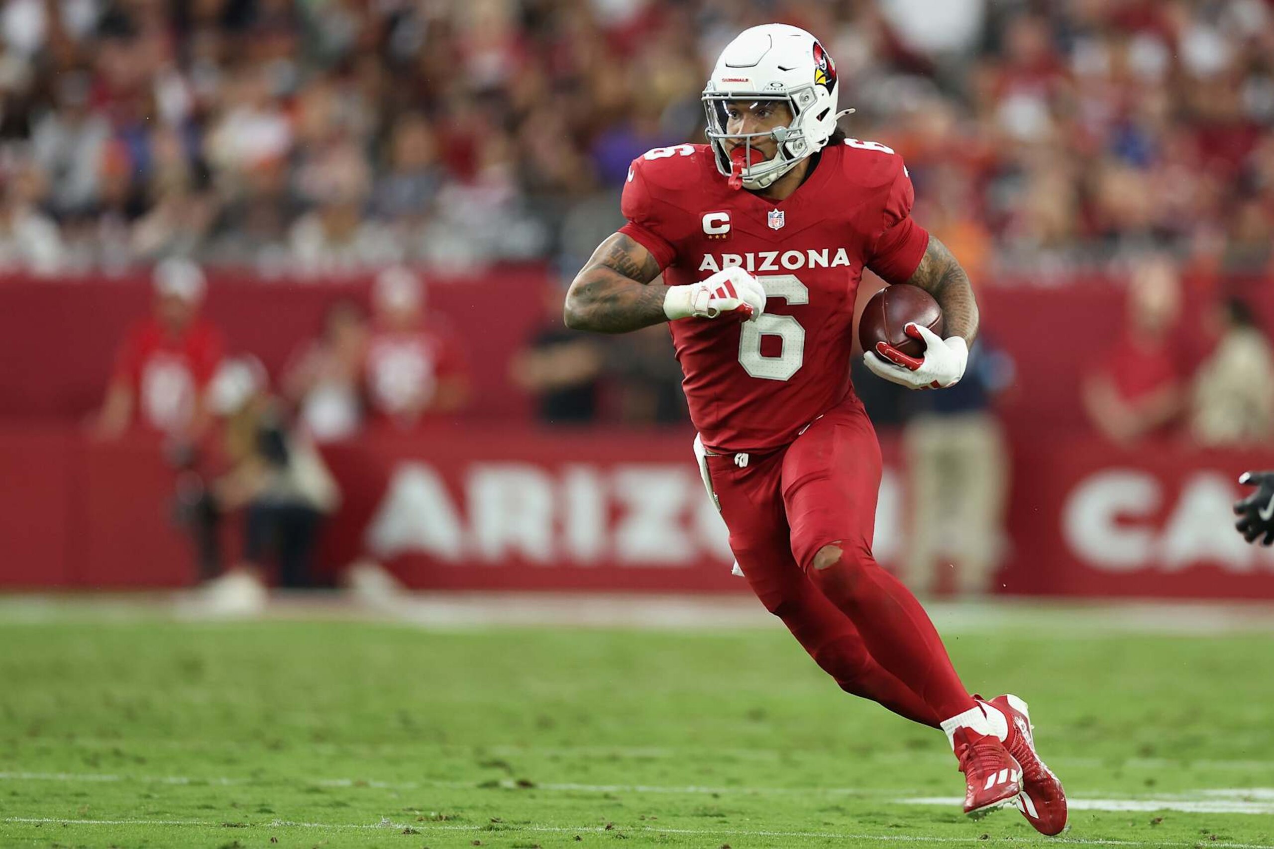 GLENDALE, ARIZONA - NOVEMBER 03: James Conner #6 of the Arizona Cardinals rushes the football against the Chicago Bears during the NFL game at State Farm Stadium on November 03, 2024 in Glendale, Arizona. The Cardinals defeated the Bears 29-9.  (Photo by Christian Petersen/Getty Images)