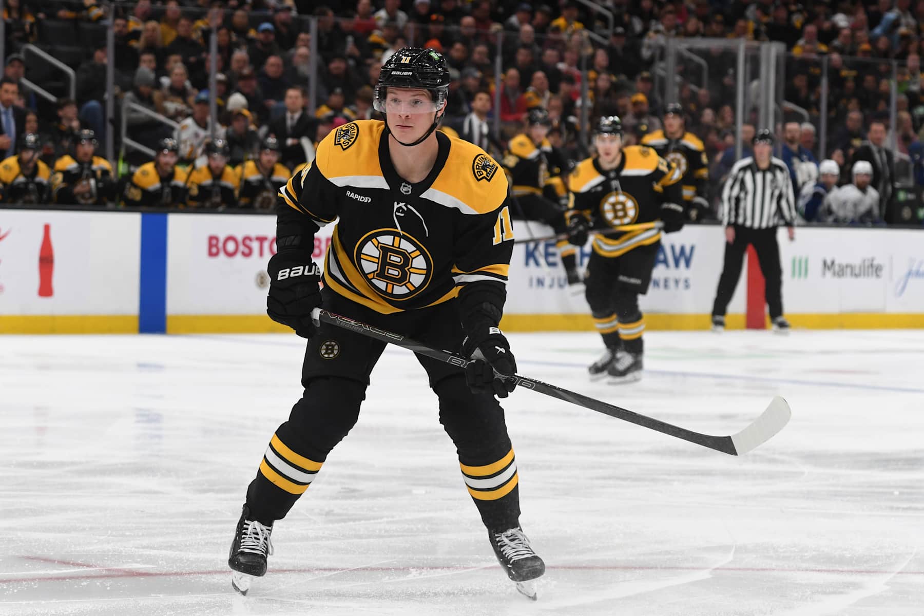 BOSTON, MASSACHUSETTS - NOVEMBER 26: Trent Frederic #11 of the Boston Bruins skates against the Vancouver Canucks on November 26, 2024, at the TD Garden in Boston, Massachusetts. (Photo by Steve Babineau/NHLI via Getty Images)