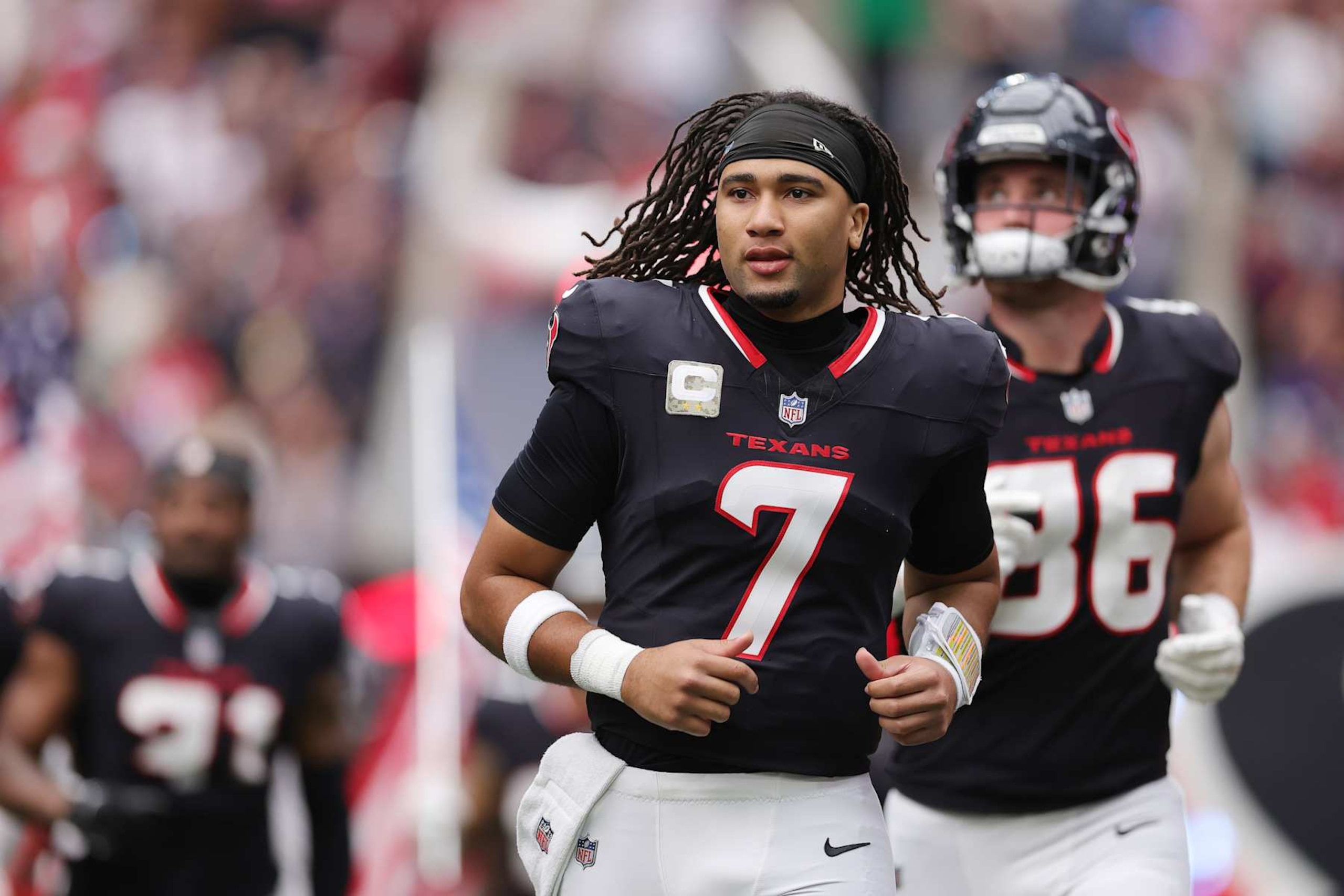 HOUSTON, TEXAS - NOVEMBER 24: C.J. Stroud #7 of the Houston Texans takes the field for a game against the Tennessee Titans at NRG Stadium on November 24, 2024 in Houston, Texas. (Photo by Alex Slitz/Getty Images)