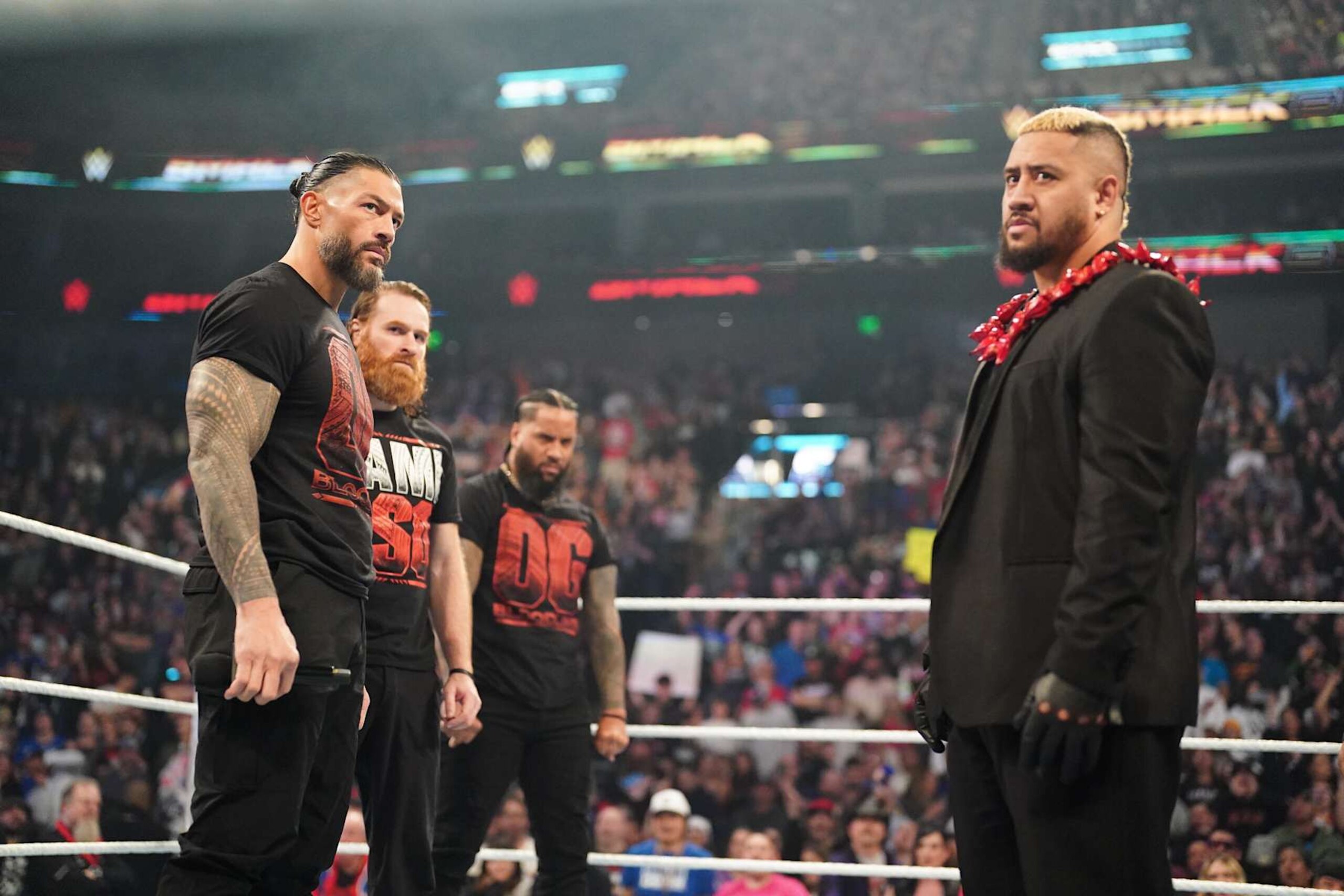 SALT LAKE CITY, UTAH - NOVEMBER 22: Sami Zayn, Roman Reigns, and Jimmy Uso and Silo Sikoa in ring during WWE SmackDown at Delta Center on November 22, 2024 in Salt Lake City, Utah. (Photo by WWE/Getty Images)