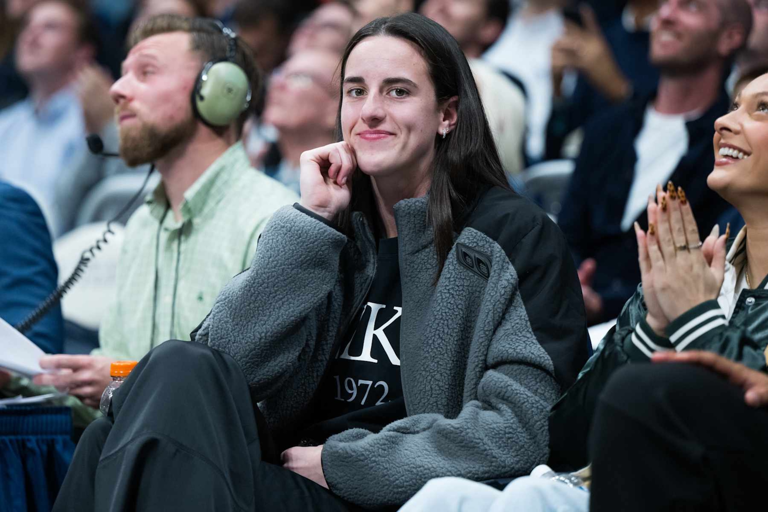 INDIANAPOLIS, IN - NOVEMBER 11: Caitlin Clark sits courtside during the men's college basketball game between the Butler Bulldogs and Western Michigan Broncos on November 11, 2024, at Hinkle Fieldhouse in Indianapolis, IN. (Photo by Zach Bolinger/Icon Sportswire via Getty Images)