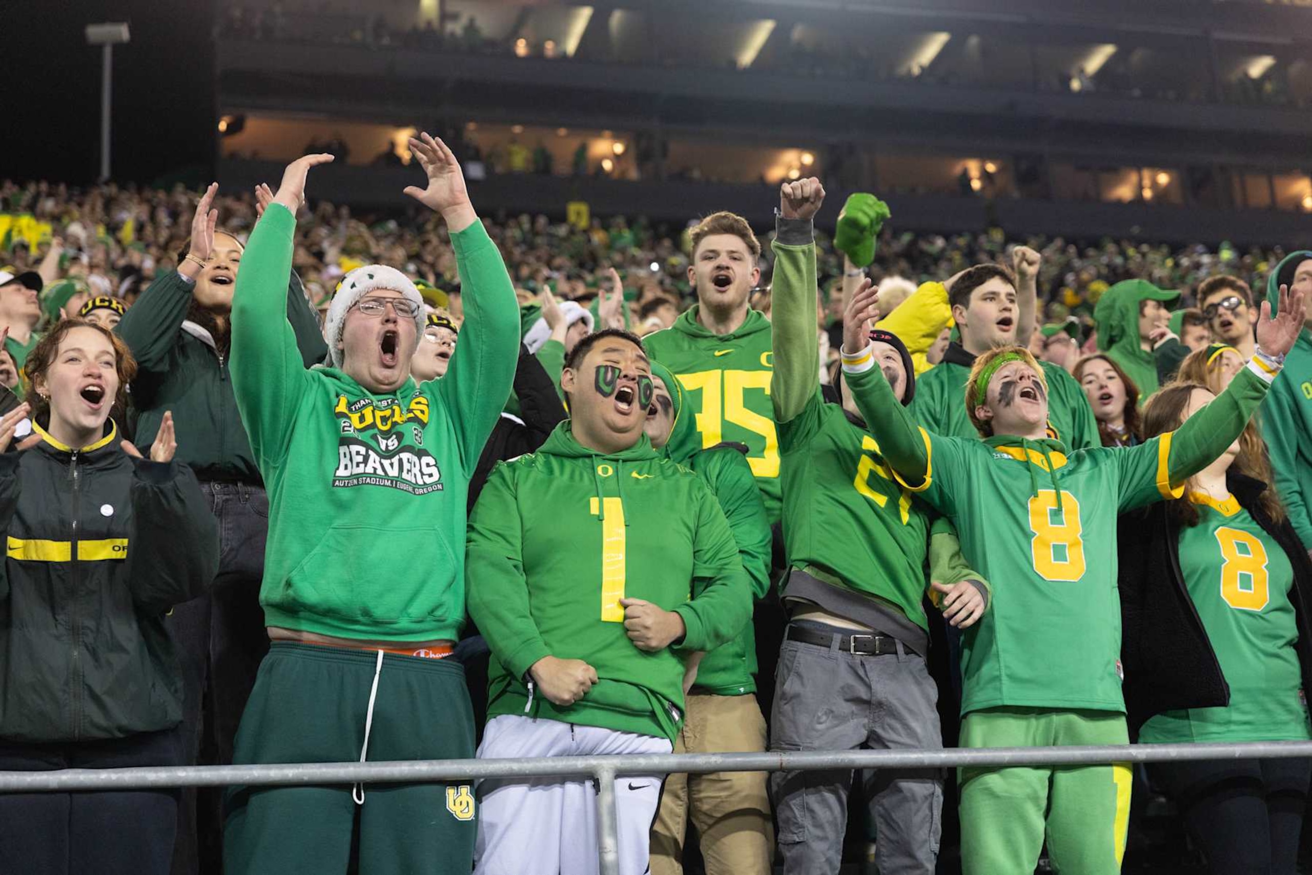 EUGENE, OREGON - NOVEMBER 30: Oregon Ducks fans cheer against the Washington Huskies during the first half at Autzen Stadium on November 30, 2024 in Eugene, Oregon.  (Photo by Tom Hauck/Getty Images)
