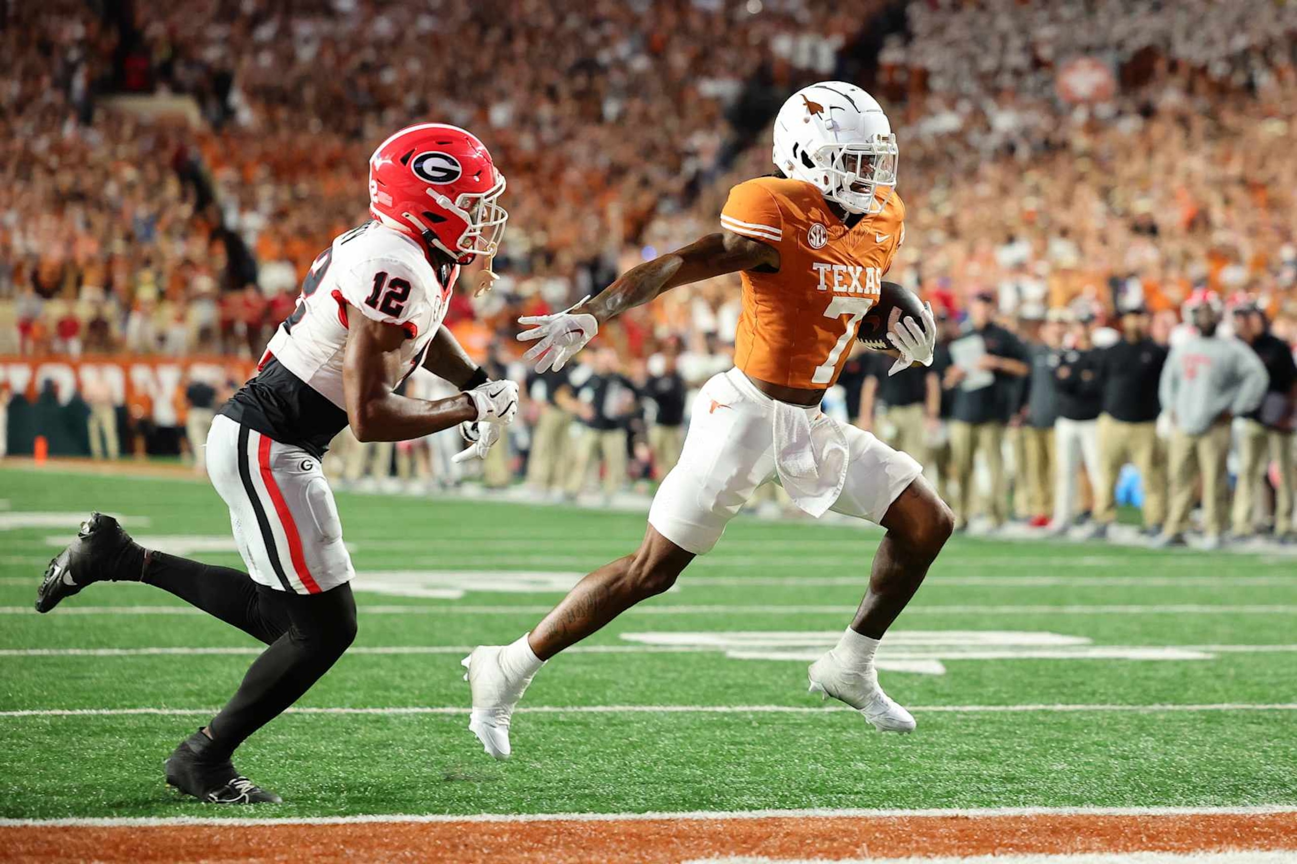 AUSTIN, TEXAS - OCTOBER 19: Isaiah Bond #7 of the Texas Longhorns scores a touchdown against Julian Humphrey #12 of the Georgia Bulldogs during the third quarter at Darrell K Royal-Texas Memorial Stadium on October 19, 2024 in Austin, Texas. (Photo by Alex Slitz/Getty Images)