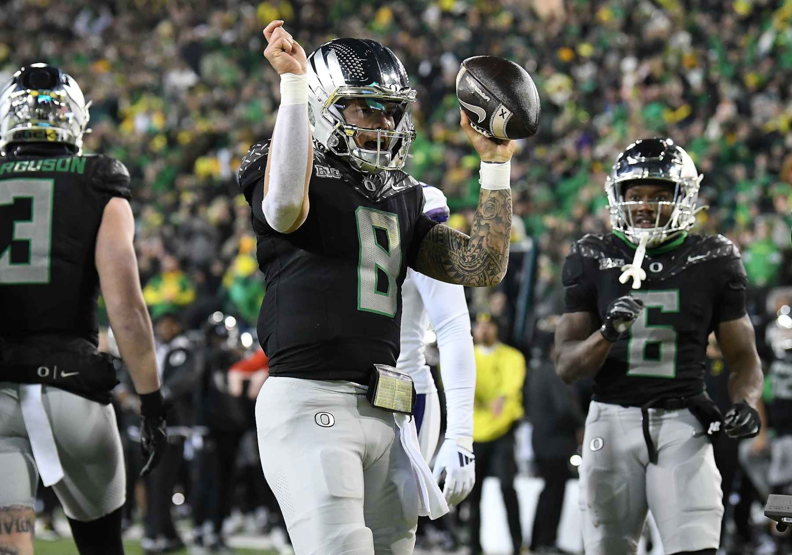 EUGENE, OR - NOVEMBER 30: Oregon Ducks quarterback Dillon Gabriel (8) celebrates after scoring on a 4-yard run during a college football game between the Washington Huskies and Oregon Ducks on November 30, 2024 at Autzen Stadium in Eugene, Oregon. (Photo by Brian Murphy/Icon Sportswire via Getty Images)