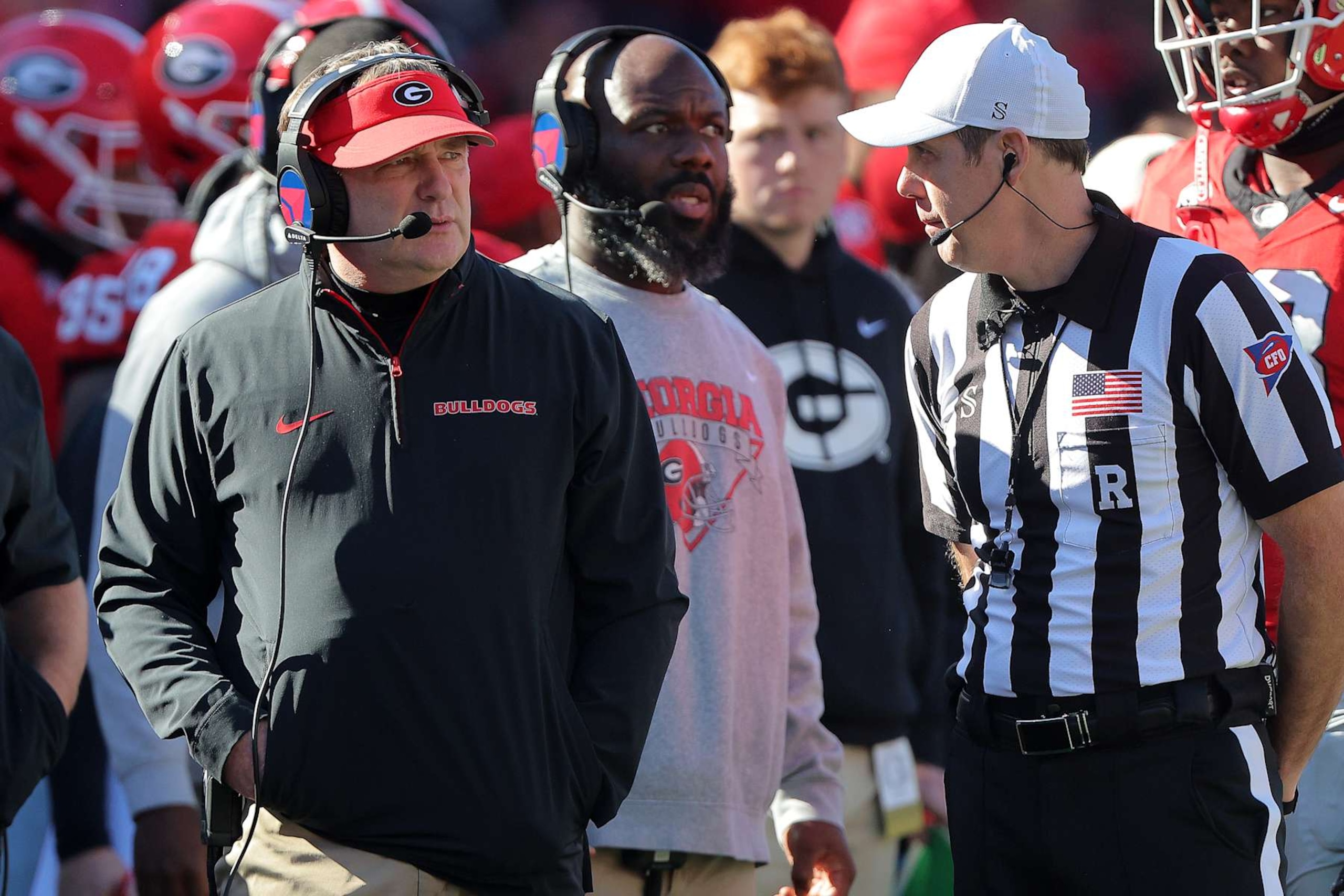 ATHENS, GA - NOVEMBER 23: Georgia Bulldogs head coach Kirby Smart listens to an official during the Saturday afternoon college football game between the Georgia Bulldogs and the Massachusetts Minutemen on November 23, 2024 on Dooley Field at Sanford Stadium in Athens, GA.  (Photo by David J. Griffin/Icon Sportswire via Getty Images)