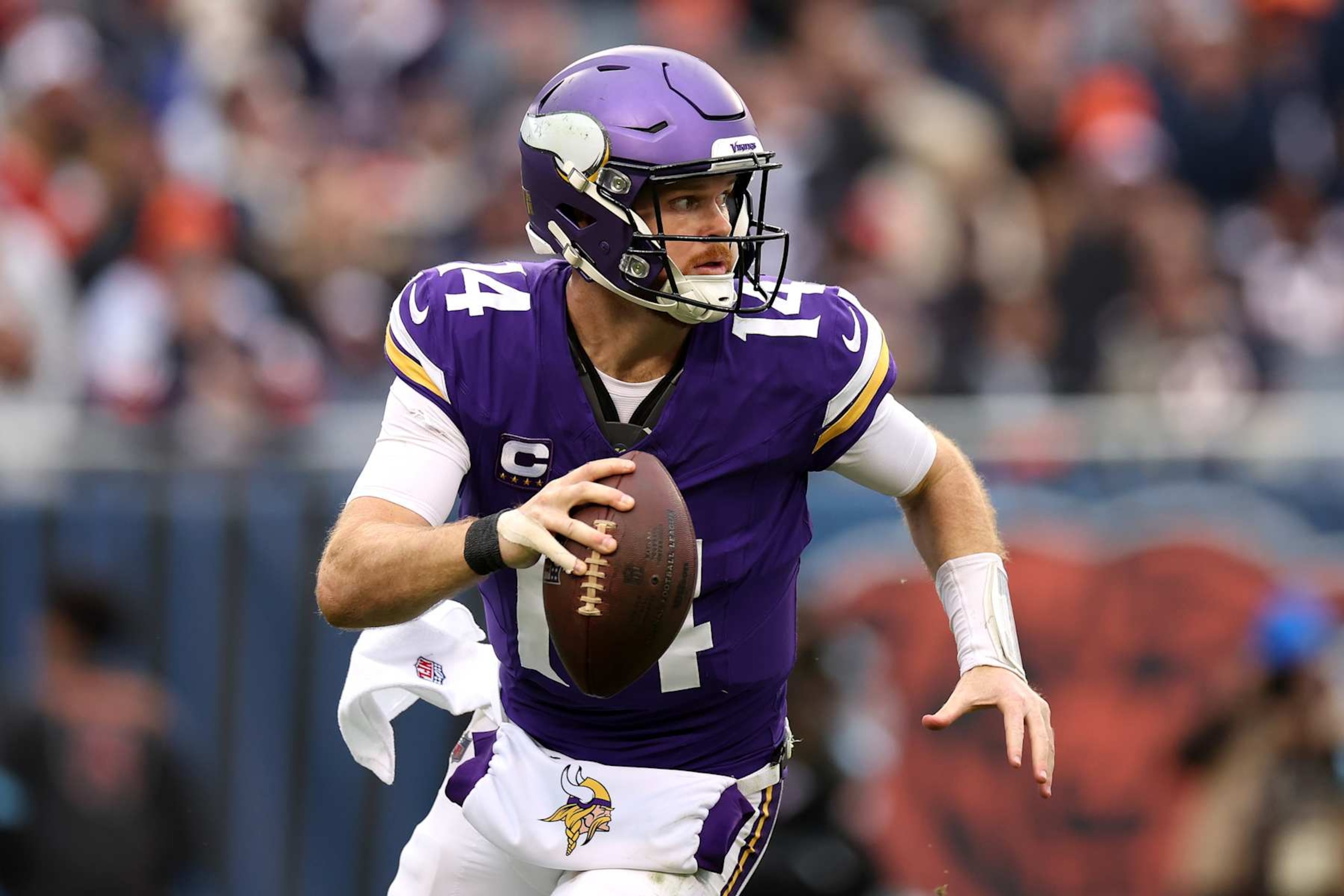 CHICAGO, ILLINOIS - NOVEMBER 24: Sam Darnold #14 of the Minnesota Vikings throws a pass against the Chicago Bears during the third quarter at Soldier Field on November 24, 2024 in Chicago, Illinois. (Photo by Luke Hales/Getty Images)