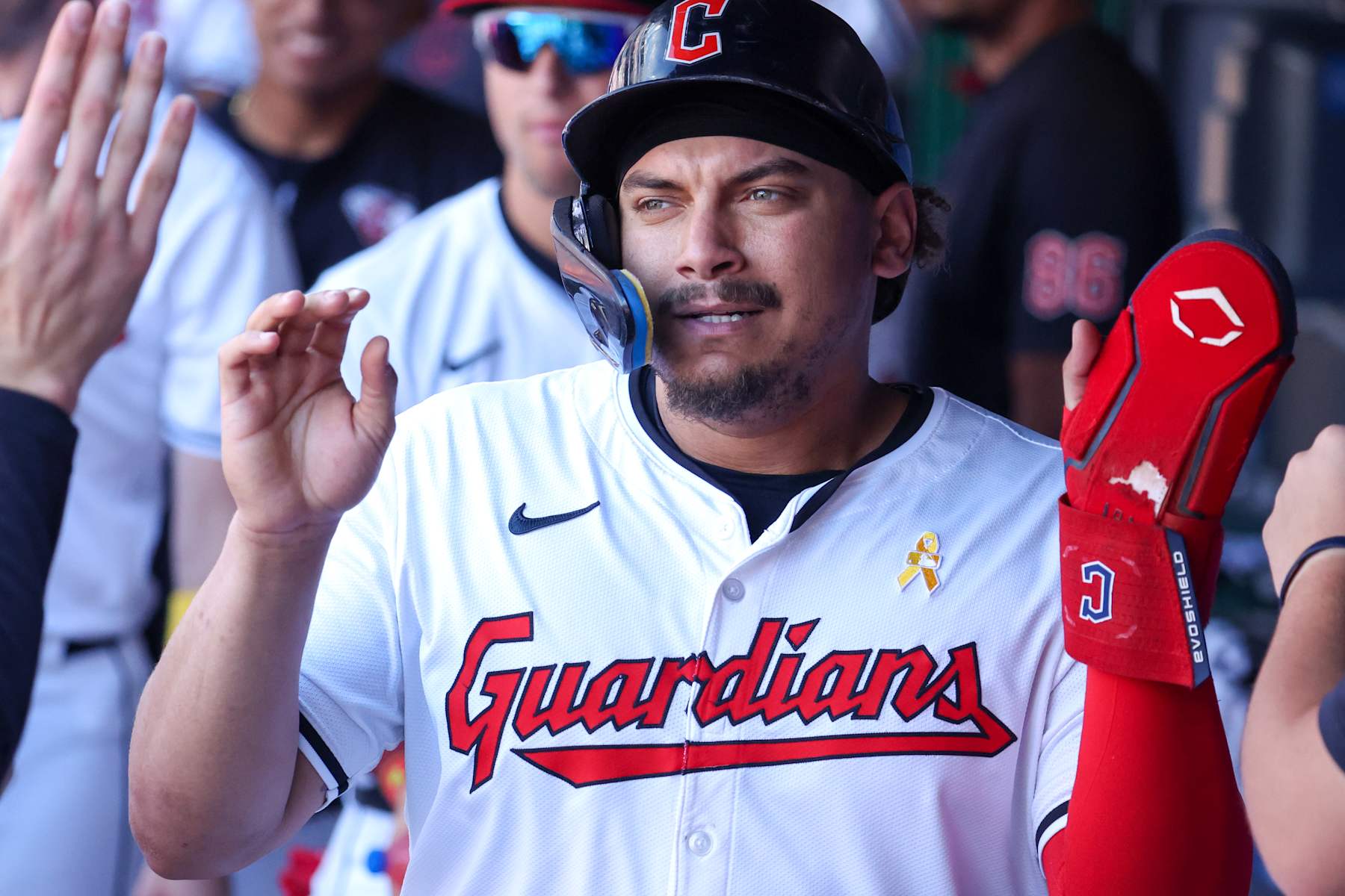 CLEVELAND, OH - SEPTEMBER 01: Cleveland Guardians first baseman Josh Naylor (22) is congratulated in the dugout after scoring a run during the seventh inning of the Major League Baseball Interleague game between the Pittsburgh Pirates and Cleveland Guardians on September 1, 2024, at Progressive Field in Cleveland, OH. (Photo by Frank Jansky/Icon Sportswire via Getty Images)