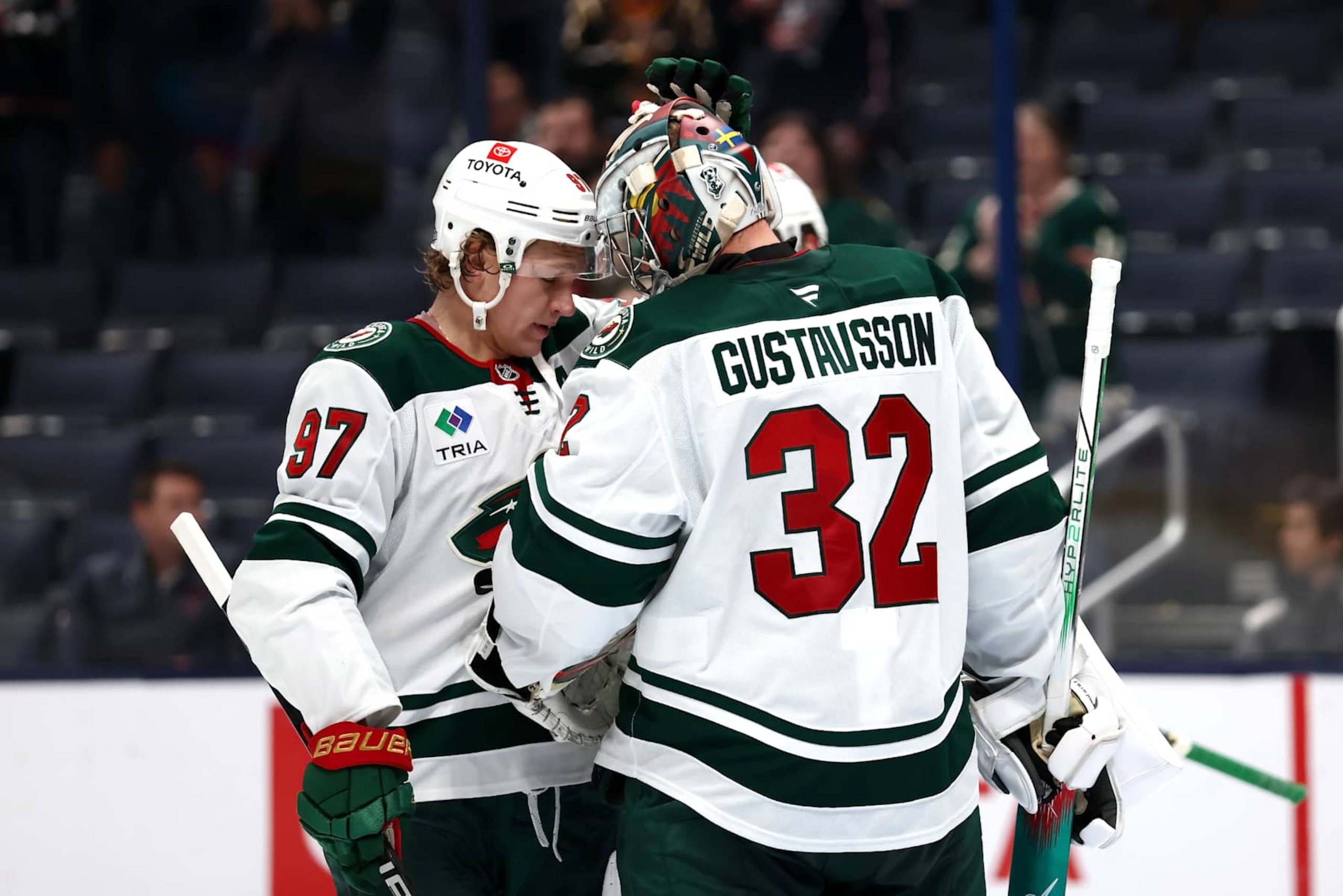 COLUMBUS, OHIO - OCTOBER 19:  Filip Gustavsson #32 of the Minnesota Wild is congratulated by Kirill Kaprizov after defeating the Columbus Blue Jackets at Nationwide Arena on October 19, 2024 in Columbus, Ohio. Minnesota defeated Columbus 3-1. (Photo by Kirk Irwin/NHLI via Getty Images)