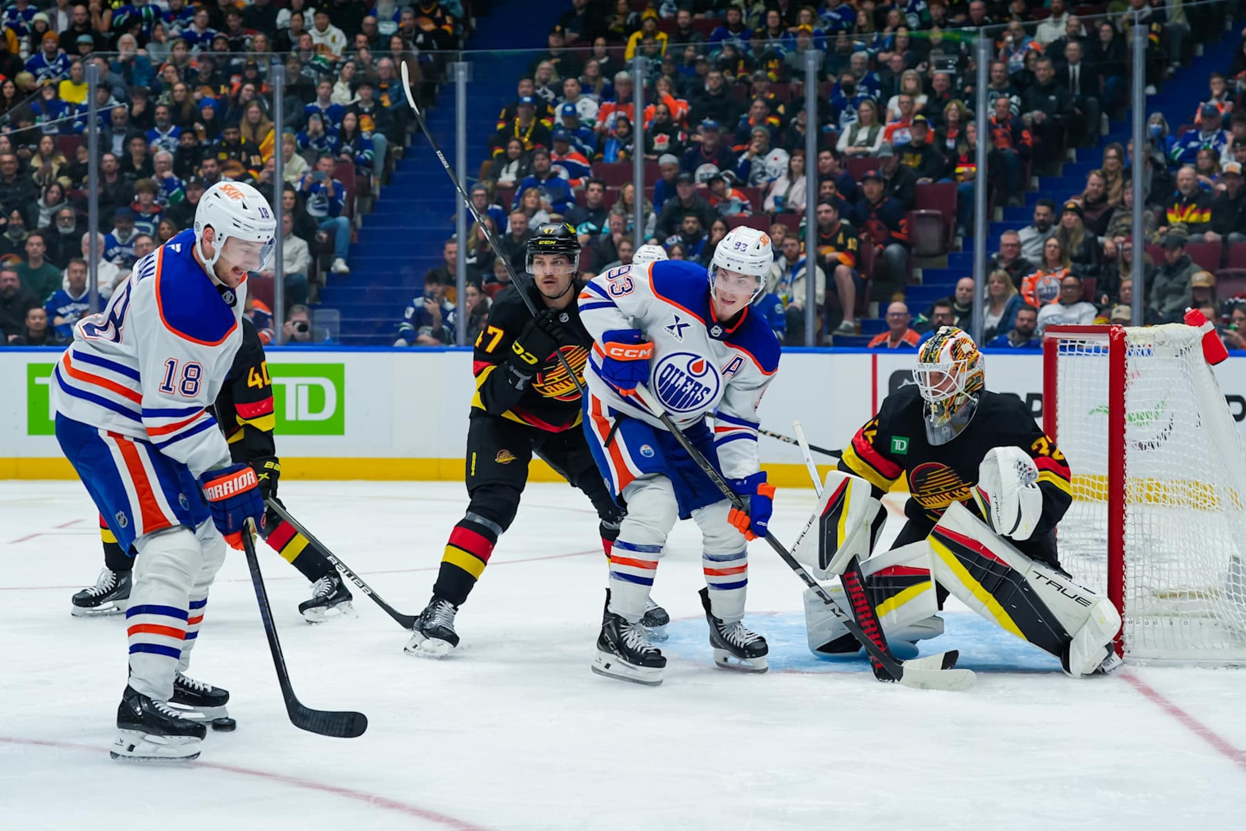 Edmonton Oilers forwards Zach Hyman (left) and Ryan Nugent-Hopkins in action against the Vancouver Canucks. 