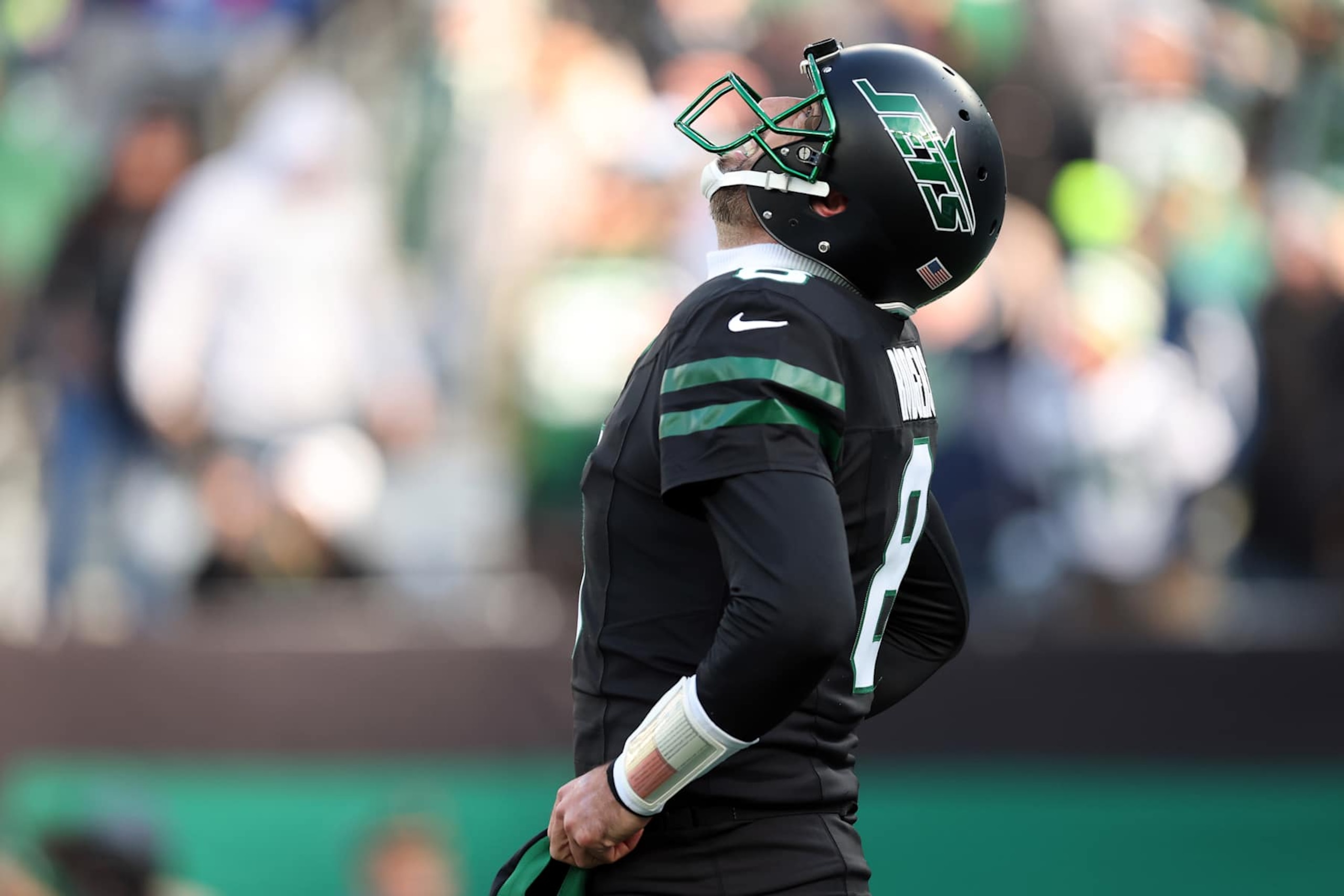 EAST RUTHERFORD, NEW JERSEY - DECEMBER 01: Aaron Rodgers #8 of the New York Jets reacts after an incomplete pass in the first quarter of a game against the Seattle Seahawks at MetLife Stadium on December 01, 2024 in East Rutherford, New Jersey. (Photo by Elsa/Getty Images)