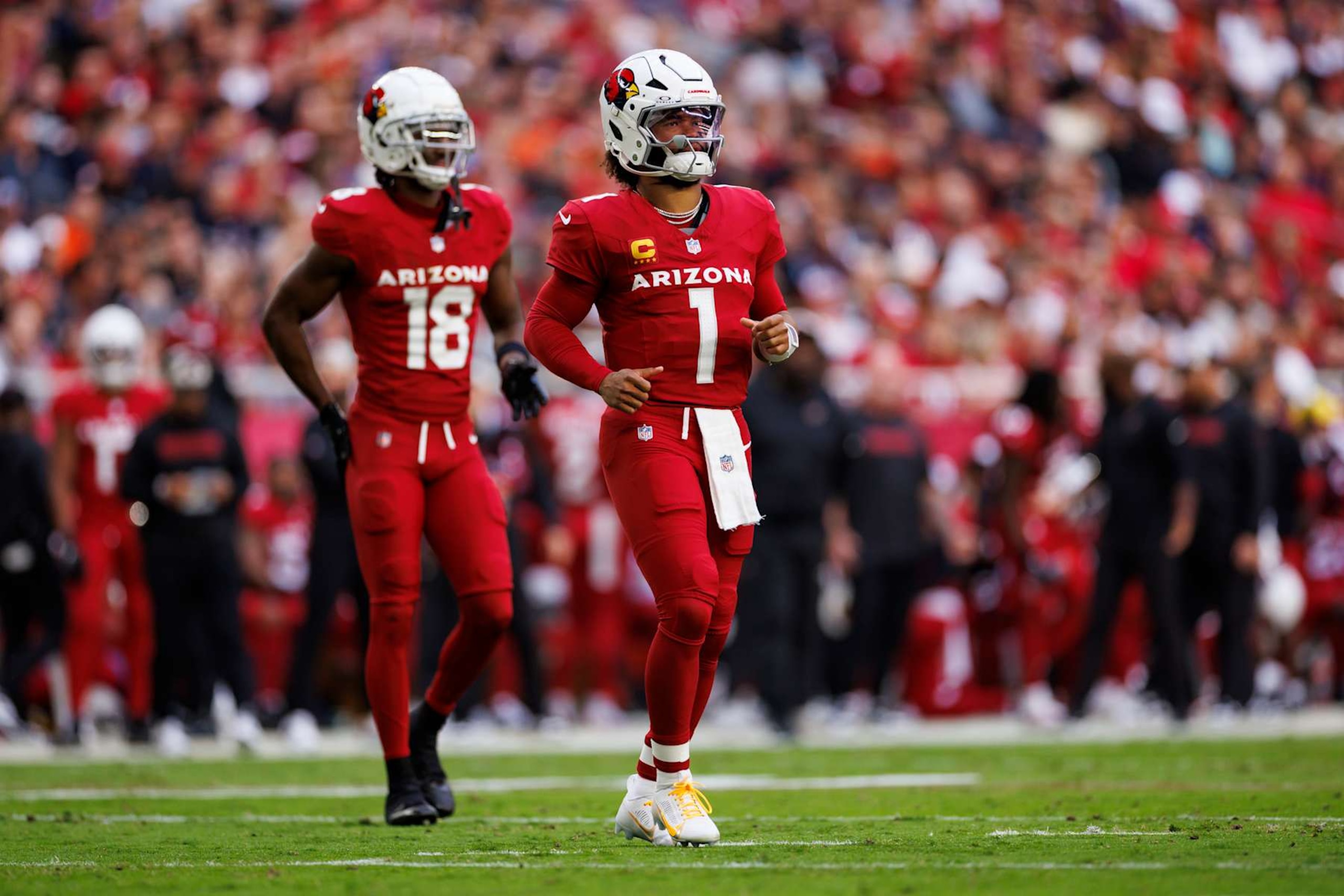 Cardinals wide receiver Marvin Harrison Jr. (left) and quarterback Kyler Murray (right)