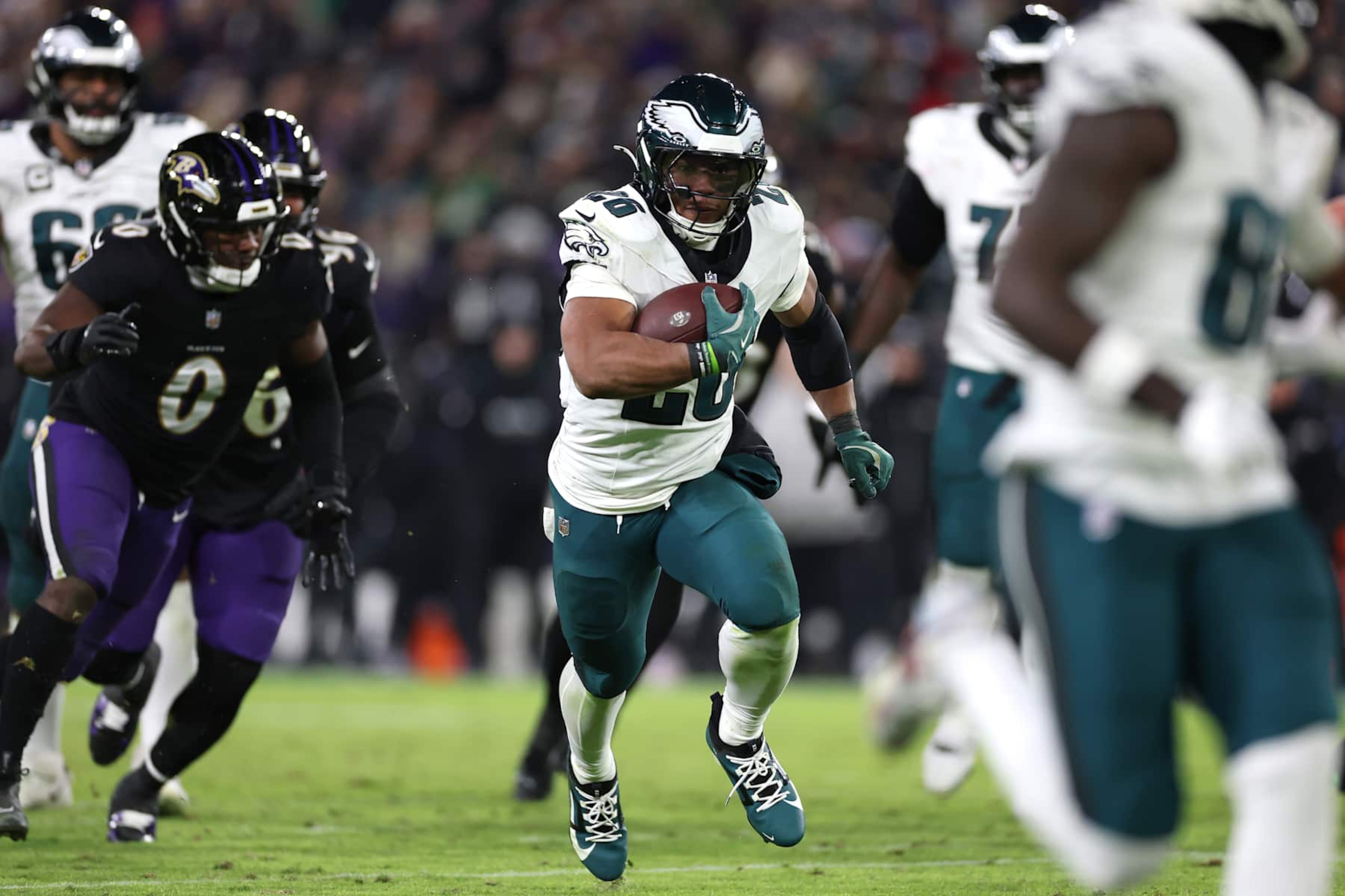 BALTIMORE, MARYLAND - DECEMBER 01: Saquon Barkley #26 of the Philadelphia Eagles runs the ball for a touchdown during the fourth quarter against the Baltimore Ravens at M&T Bank Stadium on December 01, 2024 in Baltimore, Maryland. (Photo by Patrick Smith/Getty Images)