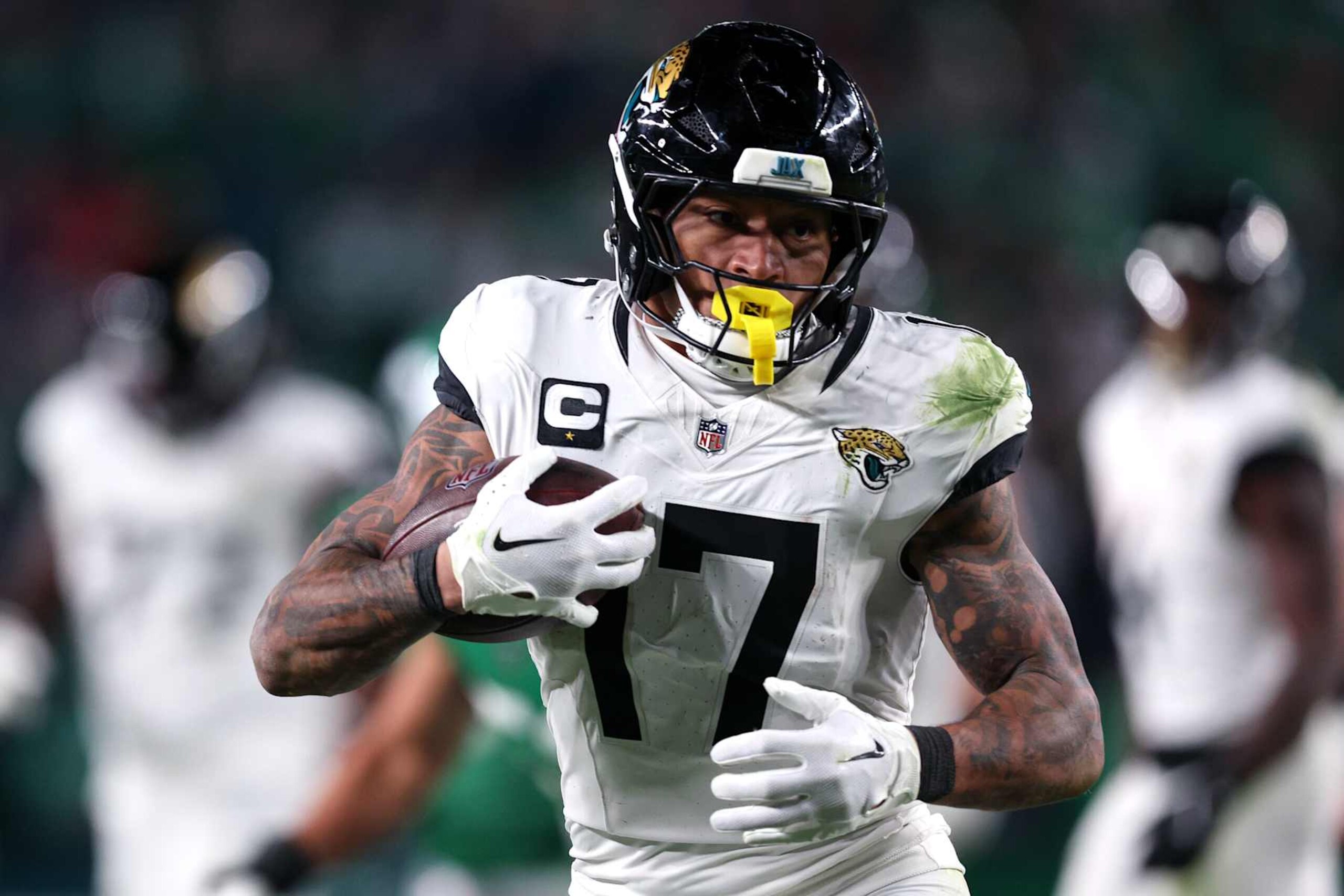 PHILADELPHIA, PENNSYLVANIA - NOVEMBER 03: Evan Engram #17 of the Jacksonville Jaguars runs after a catch in the fourth quarter of a game against the Philadelphia Eagles at Lincoln Financial Field on November 03, 2024 in Philadelphia, Pennsylvania. (Photo by Elsa/Getty Images)