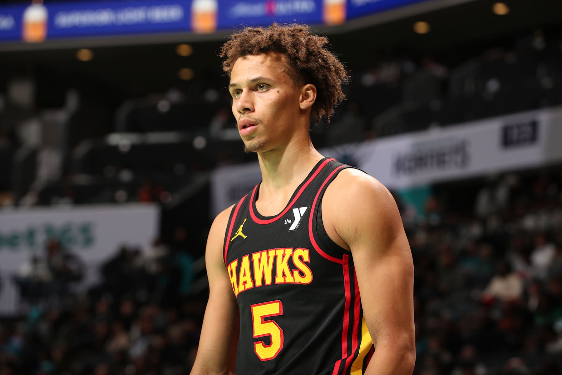 CHARLOTTE, NC - NOVEMBER 30: Dyson Daniels #5 of the Atlanta Hawks looks on during the game against the Charlotte Hornets on November 30, 2024 at Spectrum Center in Charlotte, North Carolina. NOTE TO USER: User expressly acknowledges and agrees that, by downloading and or using this photograph, User is consenting to the terms and conditions of the Getty Images License Agreement. Mandatory Copyright Notice: Copyright 2024 NBAE (Photo by Kent Smith/NBAE via Getty Images)