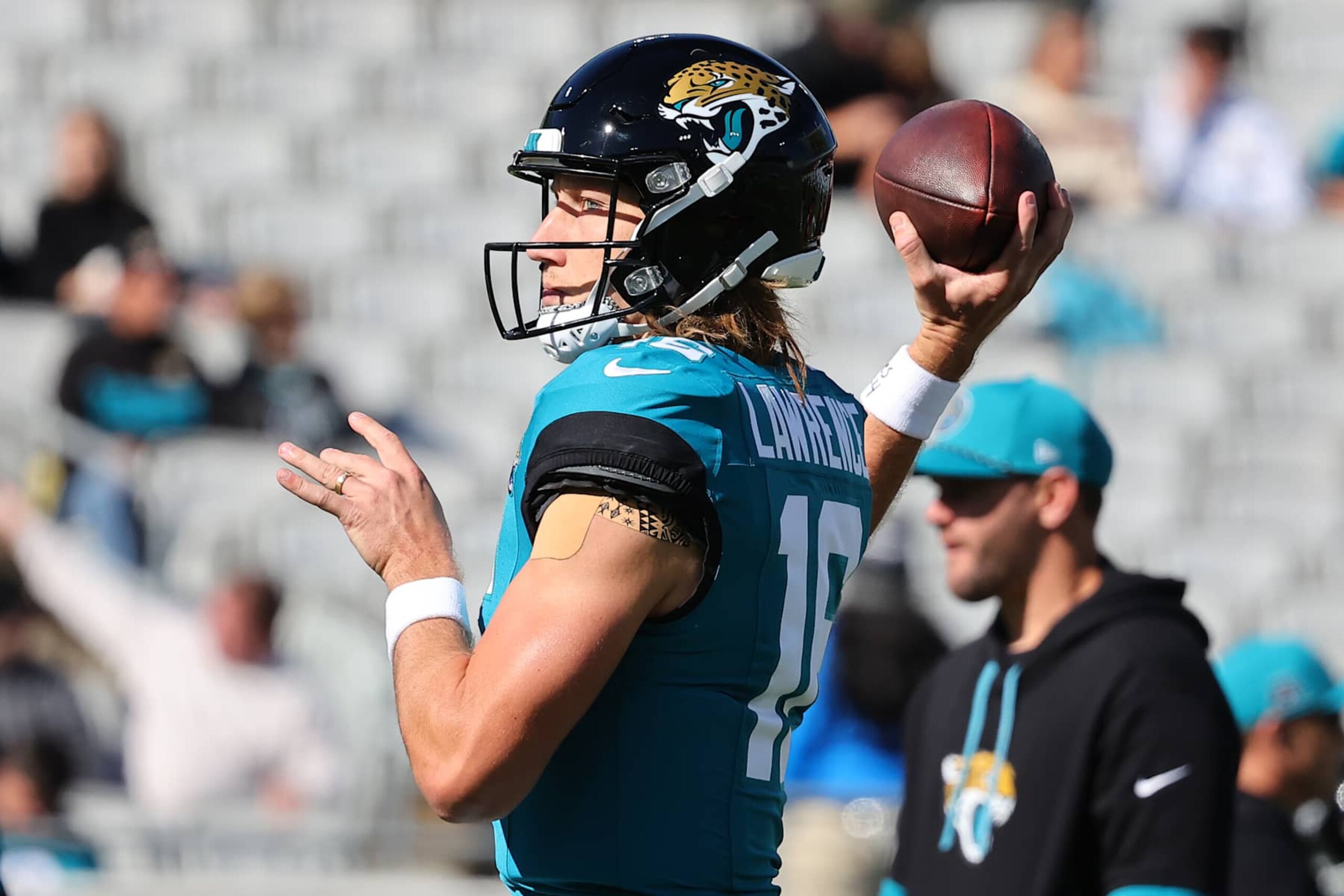 JACKSONVILLE, FLORIDA - DECEMBER 01: Quarterback Trevor Lawrence #16 of the Jacksonville Jaguars warms up prior to a game against the Houston Texans at EverBank Stadium on December 01, 2024 in Jacksonville, Florida. (Photo by Mike Carlson/Getty Images)