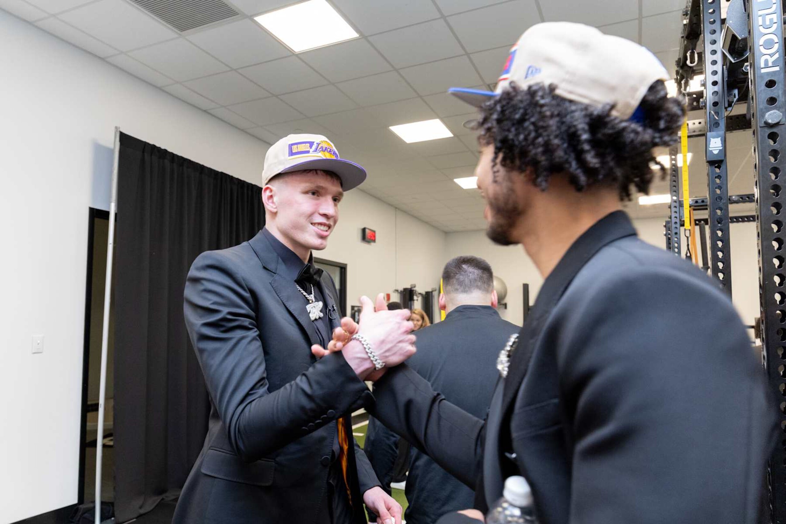 BROOKLYN, NY - JUNE 26: Dalton Knecht talks to Jared McCain laughs during the 2024 NBA Draft - Round One on June 26, 2024 at Barclays Center in Brooklyn, New York. NOTE TO USER: User expressly acknowledges and agrees that, by downloading and or using this Photograph, user is consenting to the terms and conditions of the Getty Images License Agreement. Mandatory Copyright Notice: Copyright 2024 NBAE (Photo by Dylan Goodman/NBAE via Getty Images)