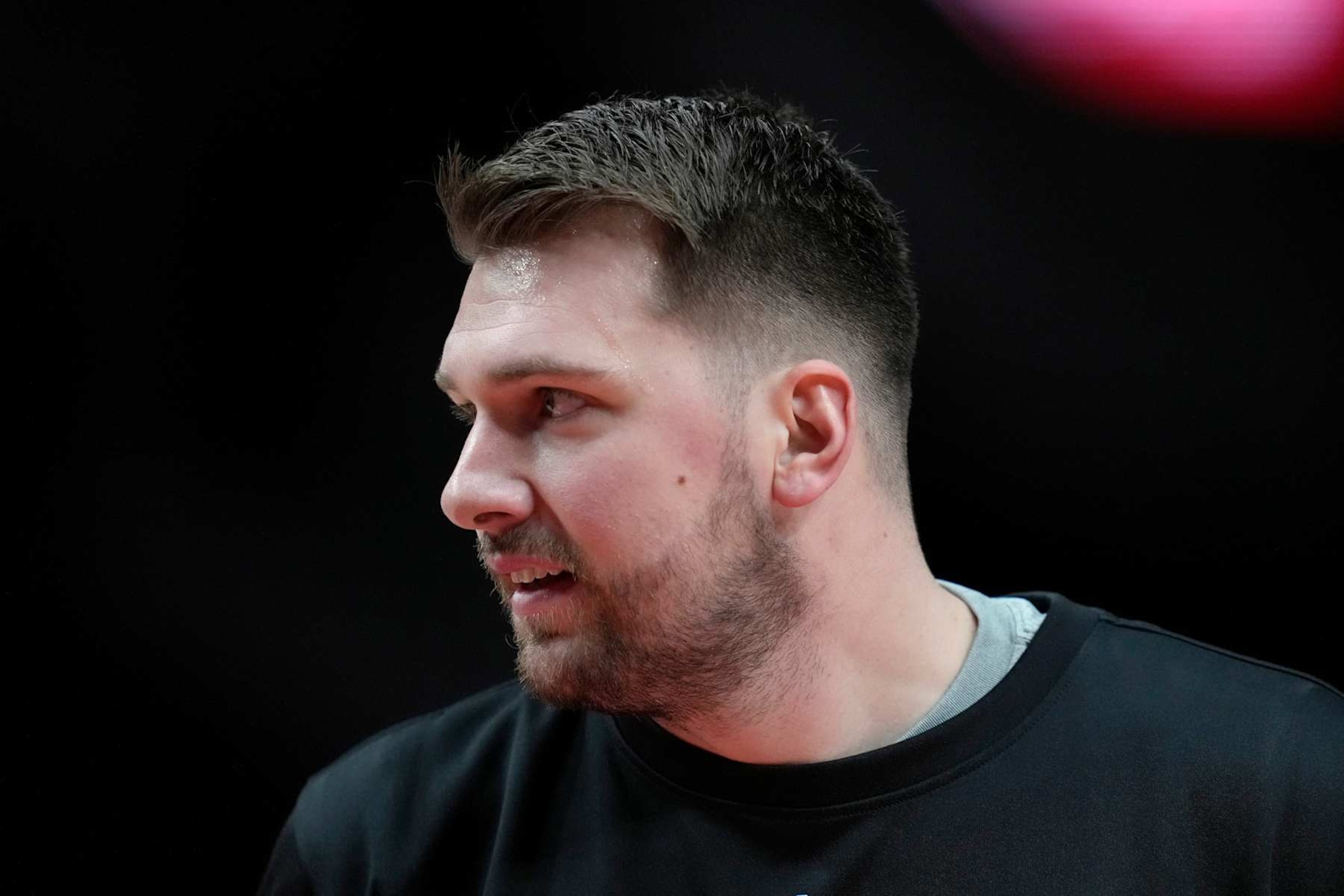 PORTLAND, OREGON - DECEMBER 01: Luka Doncic #77 of the Dallas Mavericks looks on during warm ups before the game against the Portland Trail Blazers at Moda Center on December 01, 2024 in Portland, Oregon. NOTE TO USER: User expressly acknowledges and agrees that, by downloading and or using this photograph, User is consenting to the terms and conditions of the Getty Images License Agreement. (Photo by Soobum Im/Getty Images)