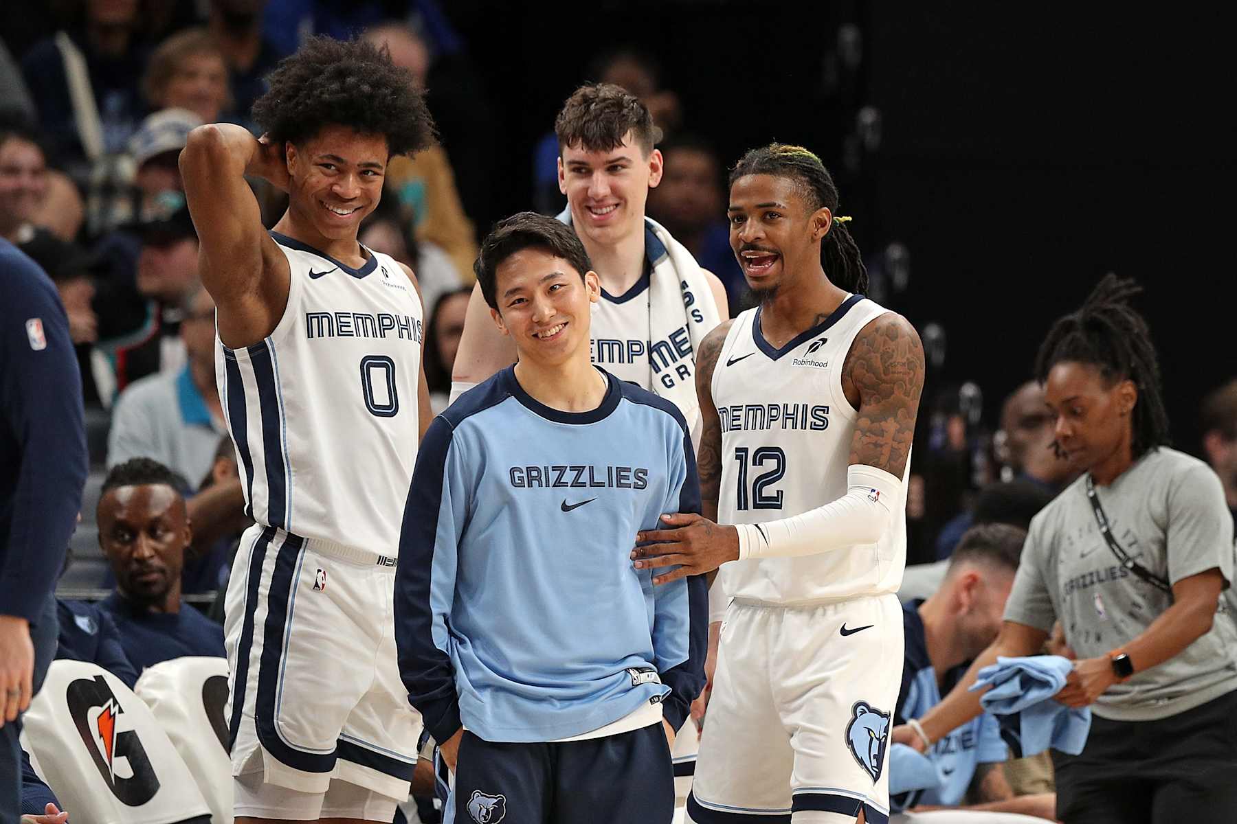 MEMPHIS, TENNESSEE - NOVEMBER 25: Ja Morant #12 of the Memphis Grizzlies and Yuki Kawamura #17 of the Memphis Grizzlies during the second half against the Portland Trail Blazers at FedExForum on November 25, 2024 in Memphis, Tennessee. NOTE TO USER: User expressly acknowledges and agrees that, by downloading and or using this photograph, User is consenting to the terms and conditions of the Getty Images License Agreement. (Photo by Justin Ford/Getty Images)