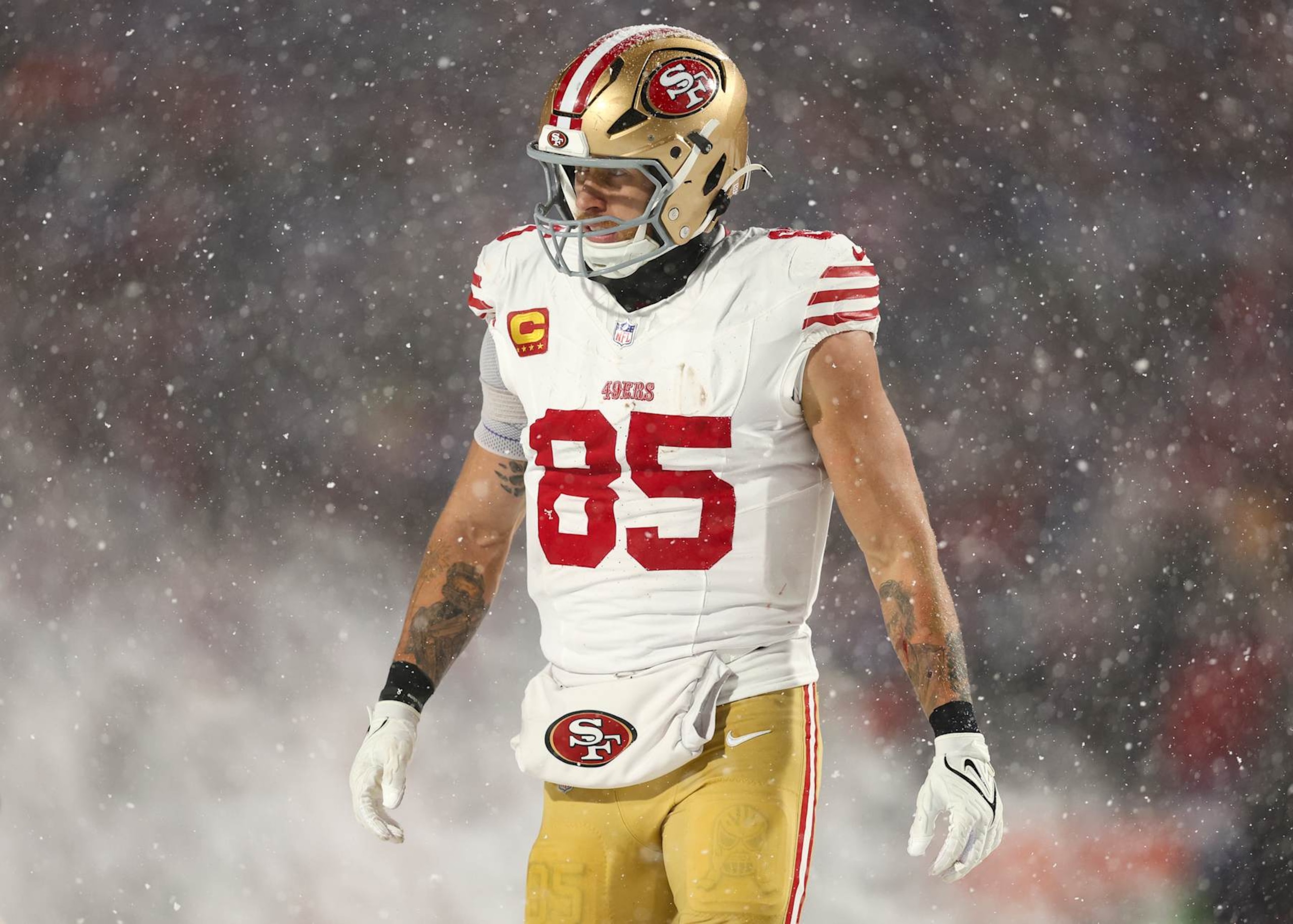 ORCHARD PARK, NEW YORK - DECEMBER 1: George Kittle #85 of the San Francisco 49ers looks on after a play during the second half of an NFL football game against the Buffalo Bills at Highmark Stadium on December 1, 2024 in Orchard Park, New York. (Photo by Kevin Sabitus/Getty Images)