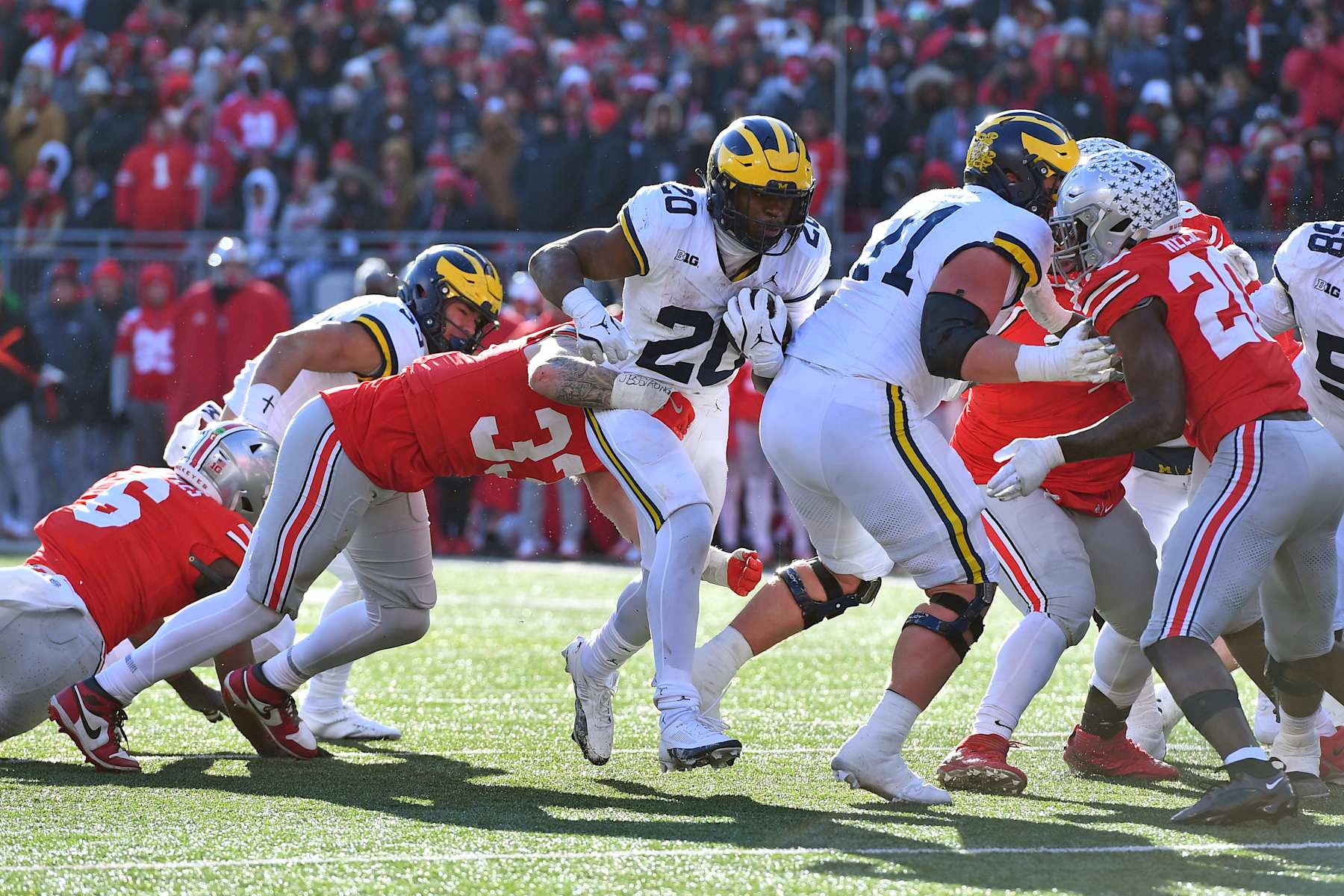 COLUMBUS, OHIO - NOVEMBER 30: Kalel Mullings #20 of the Michigan Wolverines runs with the ball during the fourth quarter of a game against the Ohio State Buckeyes at Ohio Stadium on November 30, 2024 in Columbus, Ohio. (Photo by Ben Jackson/Getty Images)
