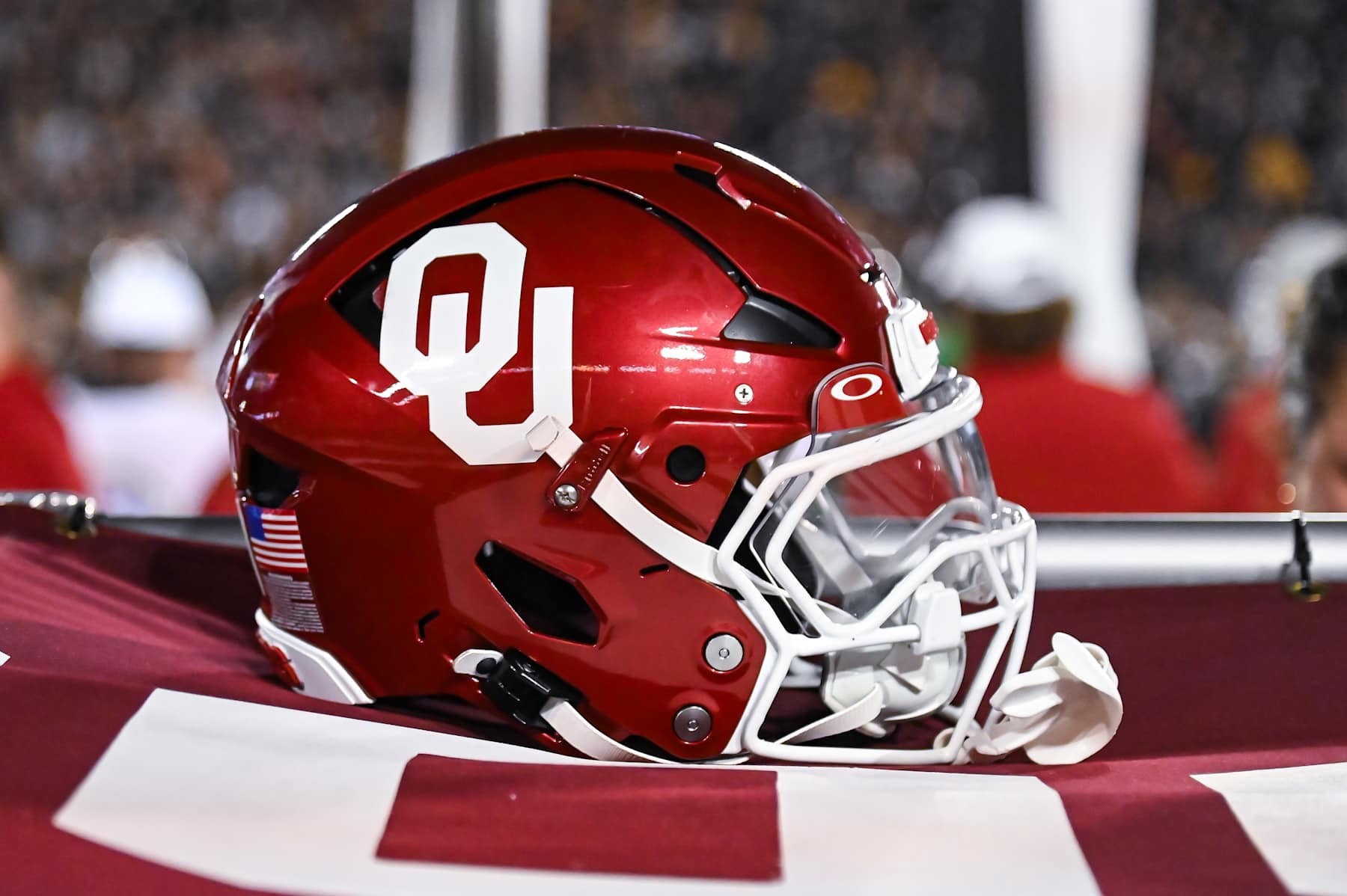 COLUMBIA, MO - NOVEMBER 09: The Oklahoma helmet sits atop of the tarp above the team bench during a SEC conference game between the Oklahoma Sooners and the Missouri Tigers held on Saturday Nov 09, 2024 at Faurot Field at Memorial Stadium in Columbia MO. (Photo by Rick Ulreich/Icon Sportswire via Getty Images COLUMBIA, MO - NOVEMBER 09: The Oklahoma helmet sits atop of the tarp above the team bench during a SEC conference game between the Oklahoma Sooners and the Missouri Tigers held on Saturday Nov 09, 2024 at Faurot Field at Memorial Stadium in Columbia MO. (Photo by Rick Ulreich/Icon Sportswire via Getty Images