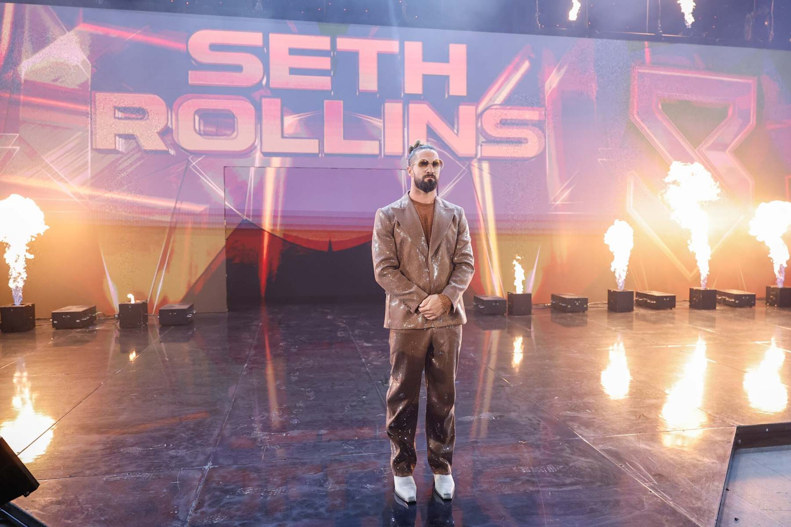 EVERETT, WASHINGTON - DECEMBER 2: Seth Rollins makes his entrance during Monday Night RAW at Angel of the Winds Arena on December 2, 2024 in Everett, Washington.  (Photo by WWE/Getty Images)