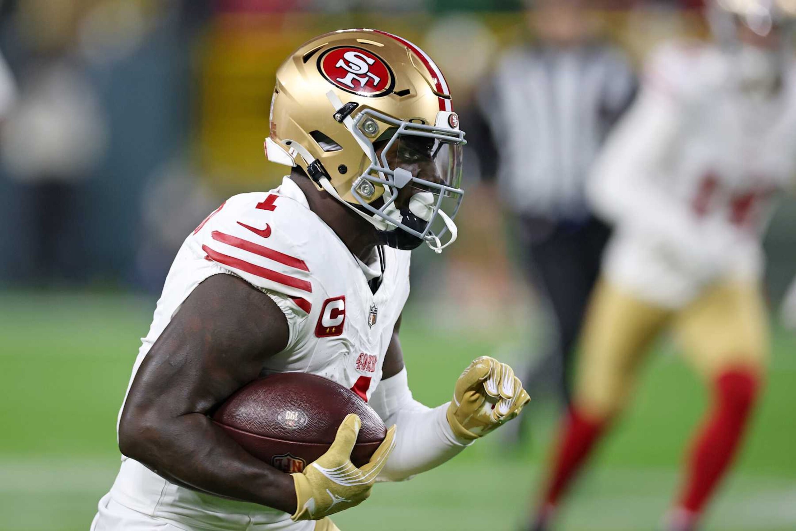 GREEN BAY, WISCONSIN - NOVEMBER 24: Deebo Samuel Sr. #1 of the San Francisco 49ers runs for yards during a game against the Green Bay Packers at Lambeau Field on November 24, 2024 in Green Bay, Wisconsin.  The Packers defeated the 49'ers 38-10. (Photo by Stacy Revere/Getty Images)