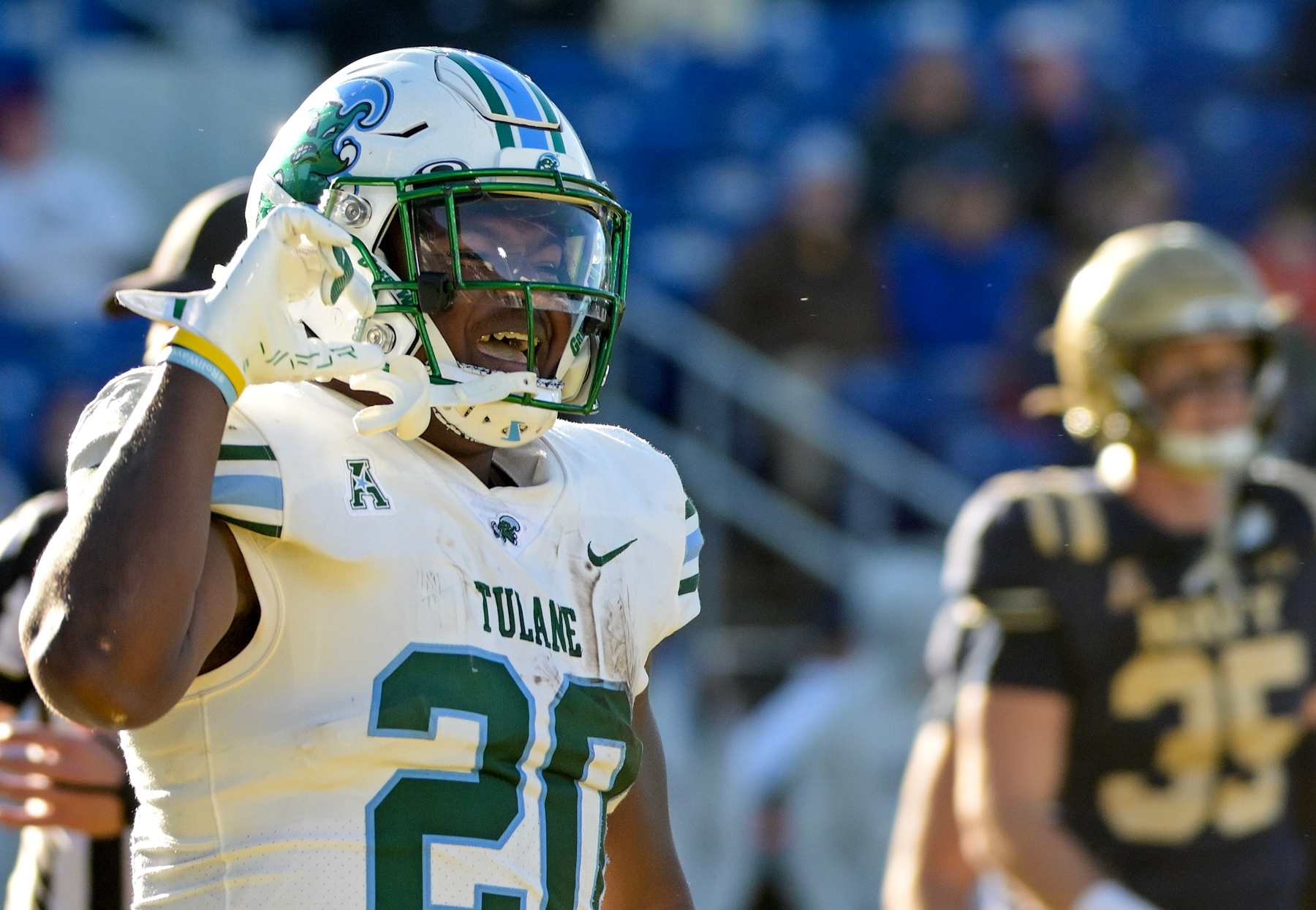 ANNAPOLIS, MD - NOVEMBER 16:  Tulane Green Wave running back Arnold Barnes III (20) celebrates a touchdown during the Tulane Green Wave game versus the Naval Academy Midshipmen on November 16, 2024 at Navy - Marine Corps Memorial Stadium in Annapolis, MD.  (Photo by Mark Goldman/Icon Sportswire via Getty Images)