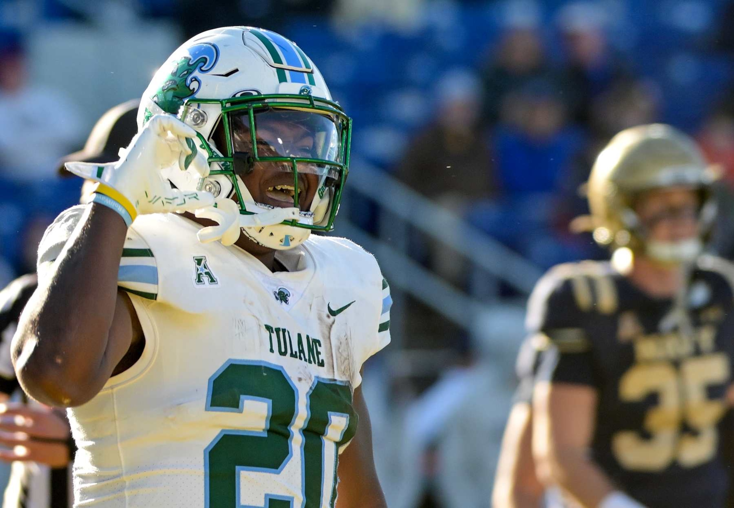 ANNAPOLIS, MD - NOVEMBER 16:  Tulane Green Wave running back Arnold Barnes III (20) celebrates a touchdown during the Tulane Green Wave game versus the Naval Academy Midshipmen on November 16, 2024 at Navy - Marine Corps Memorial Stadium in Annapolis, MD.  (Photo by Mark Goldman/Icon Sportswire via Getty Images)