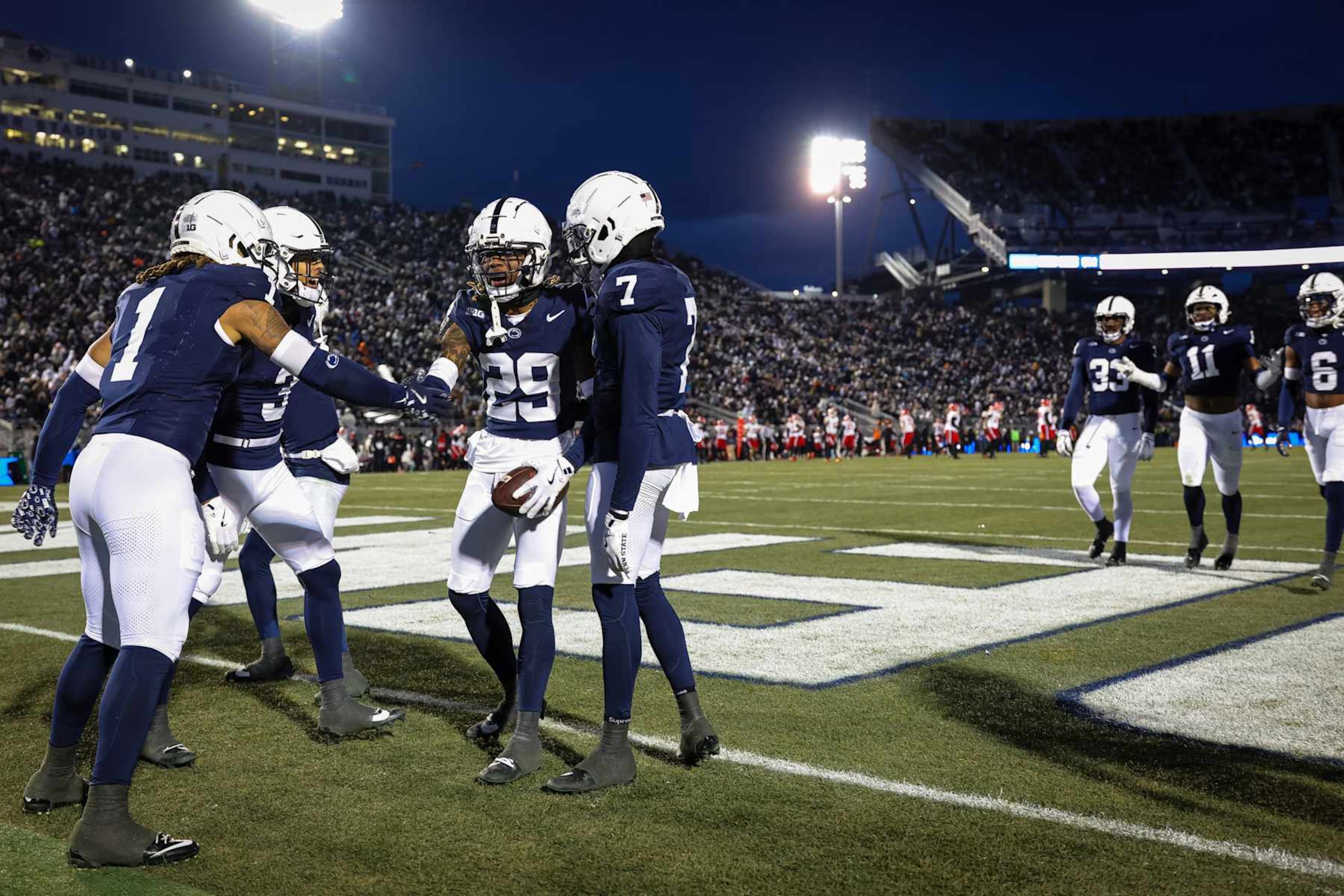 STATE COLLEGE, PA - NOVEMBER 30: Audavion Collins #29 of the Penn State Nittany Lions celebrates with teammates after intercepting a pass against the Maryland Terrapins during the first half at Beaver Stadium on November 30, 2024 in State College, Pennsylvania. (Photo by Scott Taetsch/Getty Images)