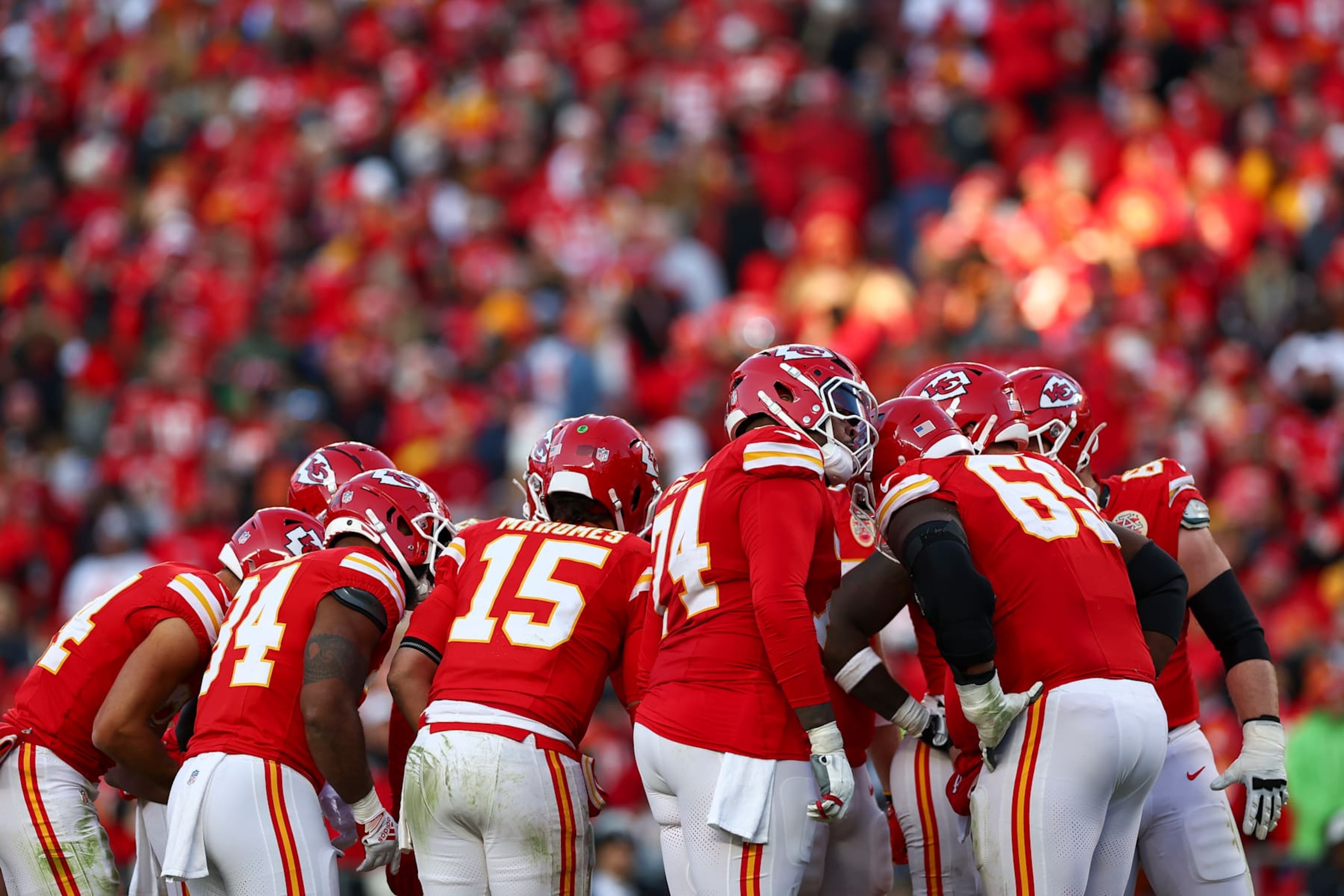 KANSAS CITY, MISSOURI - NOVEMBER 29: Patrick Mahomes #15 of the Kansas City Chiefs leads the offense in a huddle during the second half against the Las Vegas Raiders at GEHA Field at Arrowhead Stadium on November 29, 2024 in Kansas City, Missouri. (Photo by Aaron M. Sprecher/Getty Images)