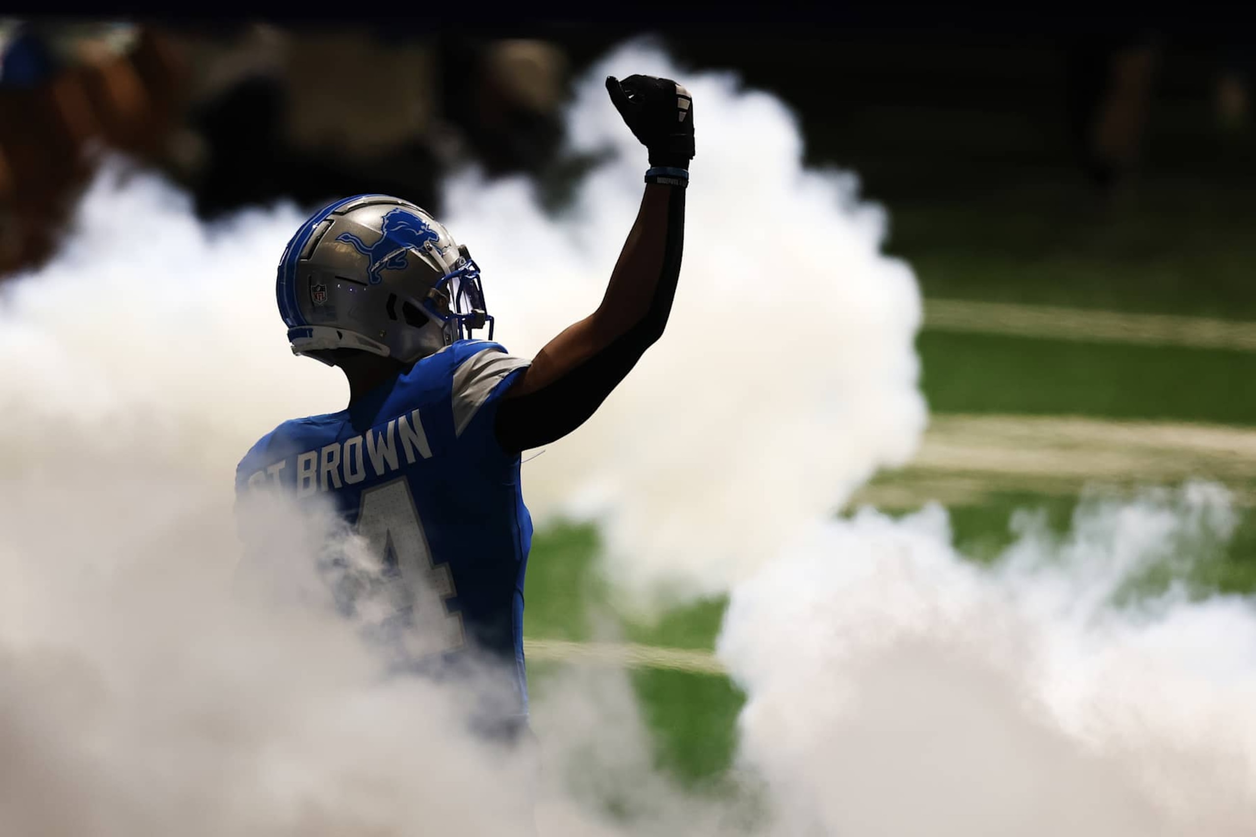 DETROIT, MICHIGAN - NOVEMBER 28: Amon-Ra St. Brown #14 of the Detroit Lions takes the field prior to a game against the Chicago Bears at Ford Field on November 28, 2024 in Detroit, Michigan. (Photo by Gregory Shamus/Getty Images)