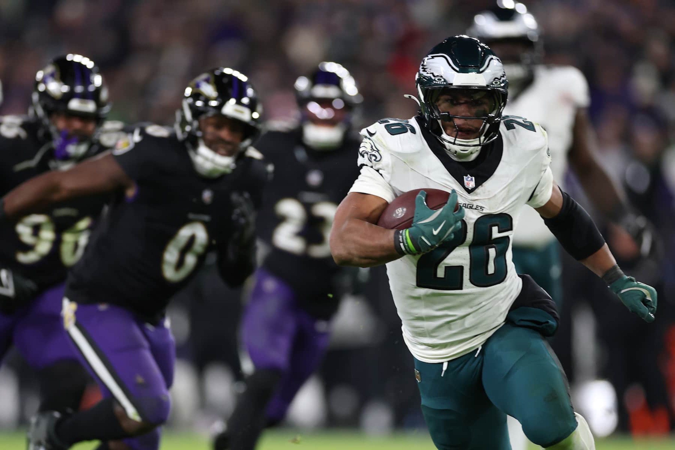BALTIMORE, MARYLAND - DECEMBER 01: Saquon Barkley #26 of the Philadelphia Eagles runs the ball for a touchdown during the fourth quarter against the Baltimore Ravens at M&T Bank Stadium on December 01, 2024 in Baltimore, Maryland. (Photo by Patrick Smith/Getty Images)