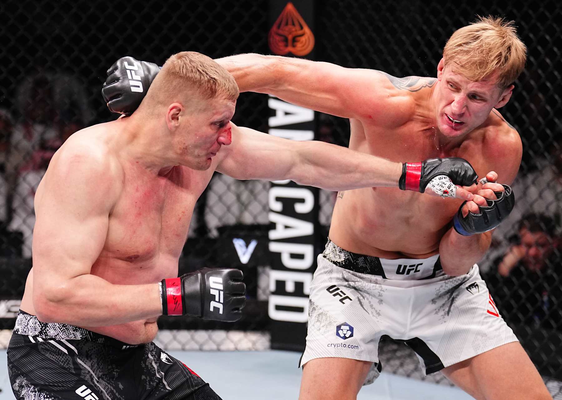 Alexander Volkov punches Sergei Pavlovich