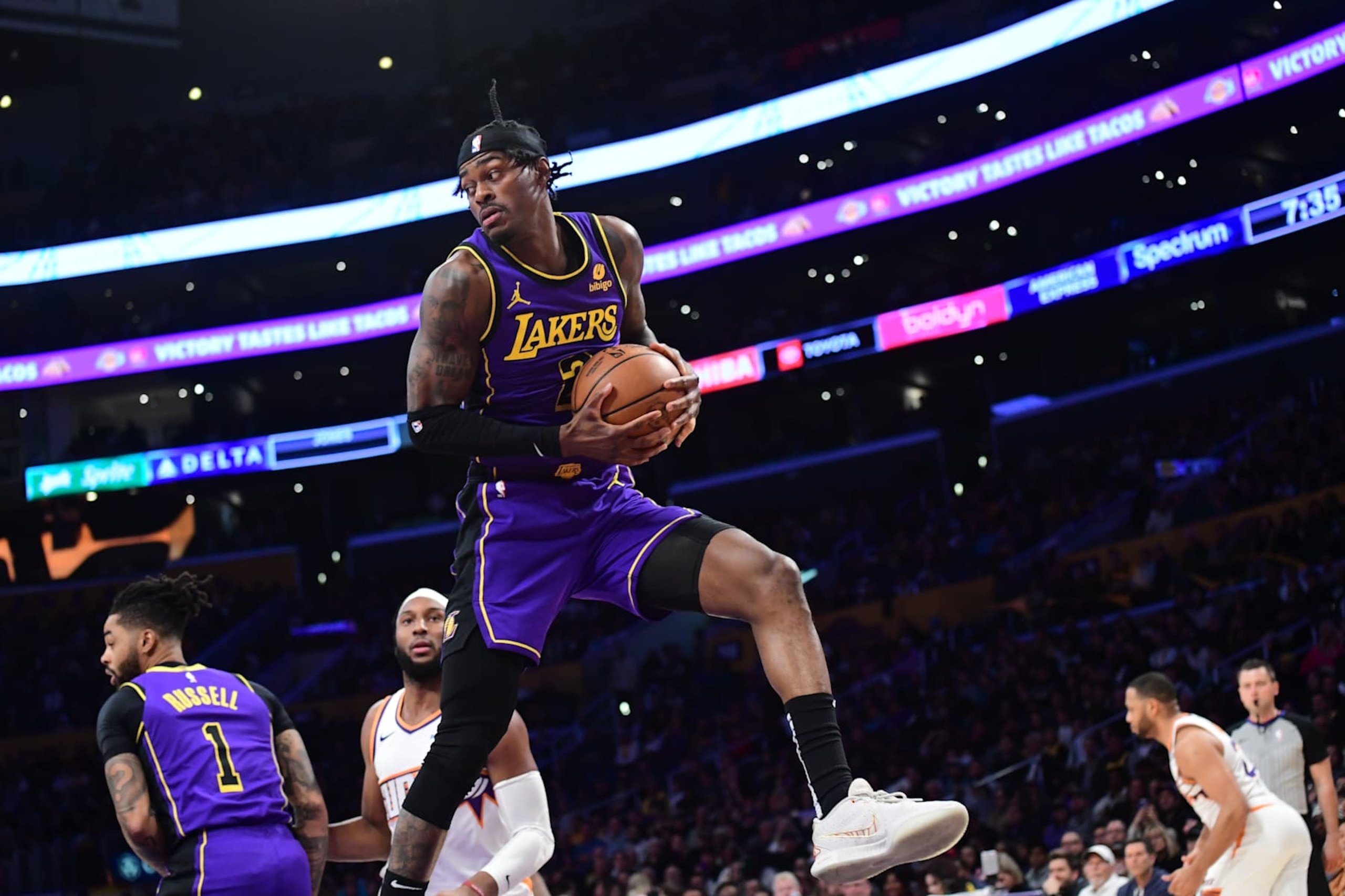 LOS ANGELES, CA - JANUARY 11: Jarred Vanderbilt #2 of the Los Angeles Lakers grabs the rebound during the game against the Phoenix Suns on January 11, 2024 at Crypto.Com Arena in Los Angeles, California. NOTE TO USER: User expressly acknowledges and agrees that, by downloading and/or using this Photograph, user is consenting to the terms and conditions of the Getty Images License Agreement. Mandatory Copyright Notice: Copyright 2024 NBAE (Photo by Adam Pantozzi/NBAE via Getty Images)