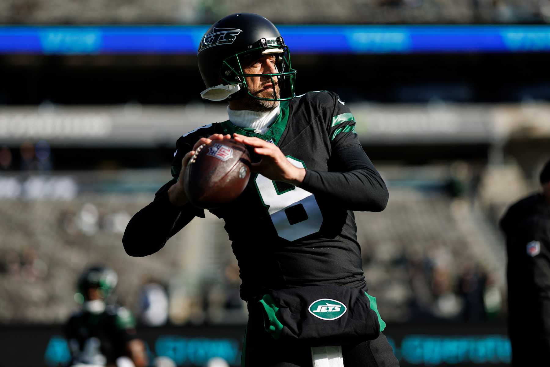 EAST RUTHERFORD, NEW JERSEY - DECEMBER 1: Quarterback Aaron Rodgers #8 of the New York Jets warms up prior to an NFL football game against the Seattle Seahawks, at MetLife Stadium on December 1, 2024 in East Rutherford, New Jersey. (Photo by Brooke Sutton/Getty Images)