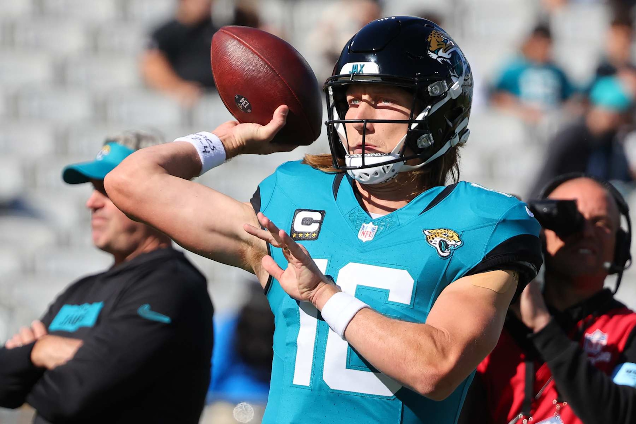 JACKSONVILLE, FLORIDA - DECEMBER 01: Quarterback Trevor Lawrence #16 of the Jacksonville Jaguars warms up prior to a game against the Houston Texans at EverBank Stadium on December 01, 2024 in Jacksonville, Florida. (Photo by Mike Carlson/Getty Images)