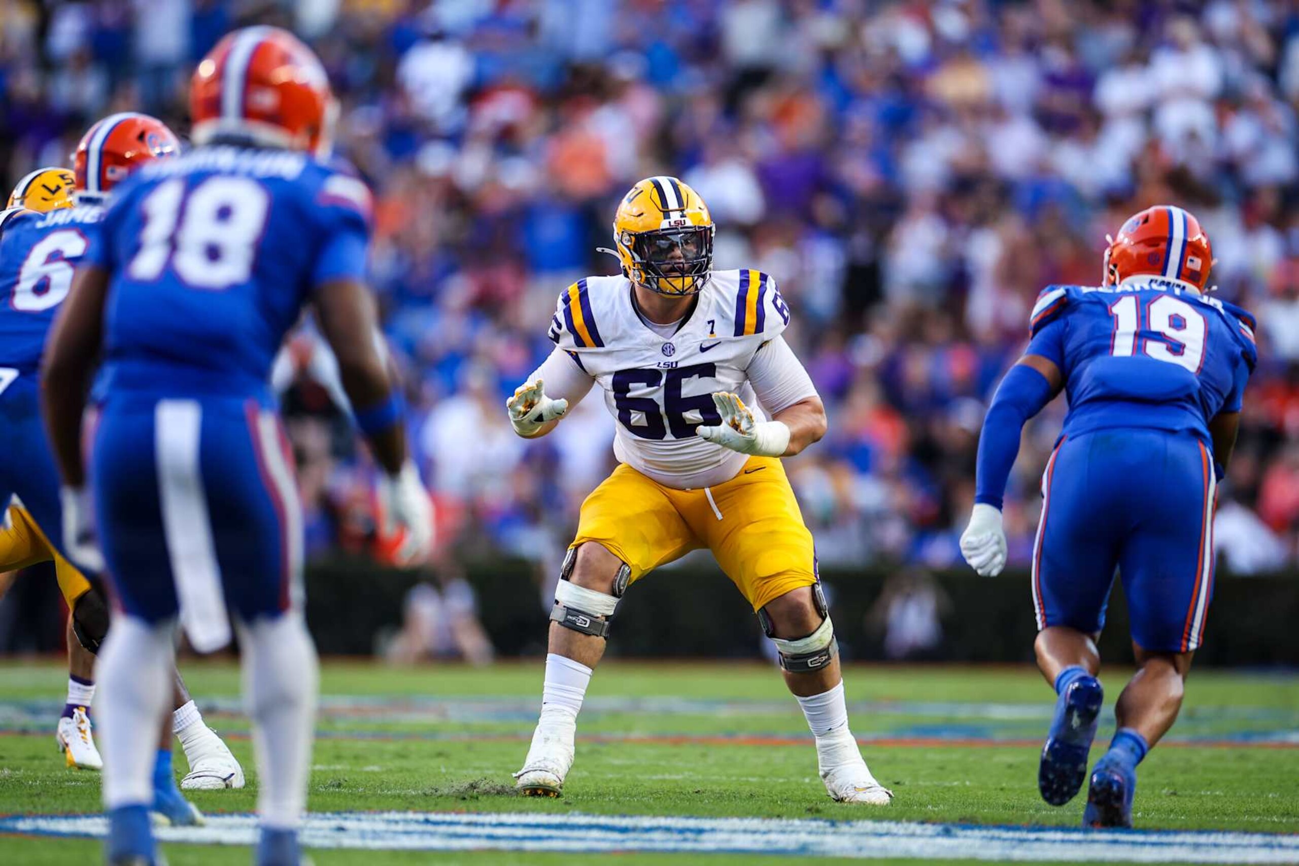 GAINESVILLE, FLORIDA - NOVEMBER 16: Will Campbell #66 of the LSU Tigers blocks during the 1st half of a game against the Florida Gators at Ben Hill Griffin Stadium on November 16, 2024 in Gainesville, Florida. (Photo by James Gilbert/Getty Images)